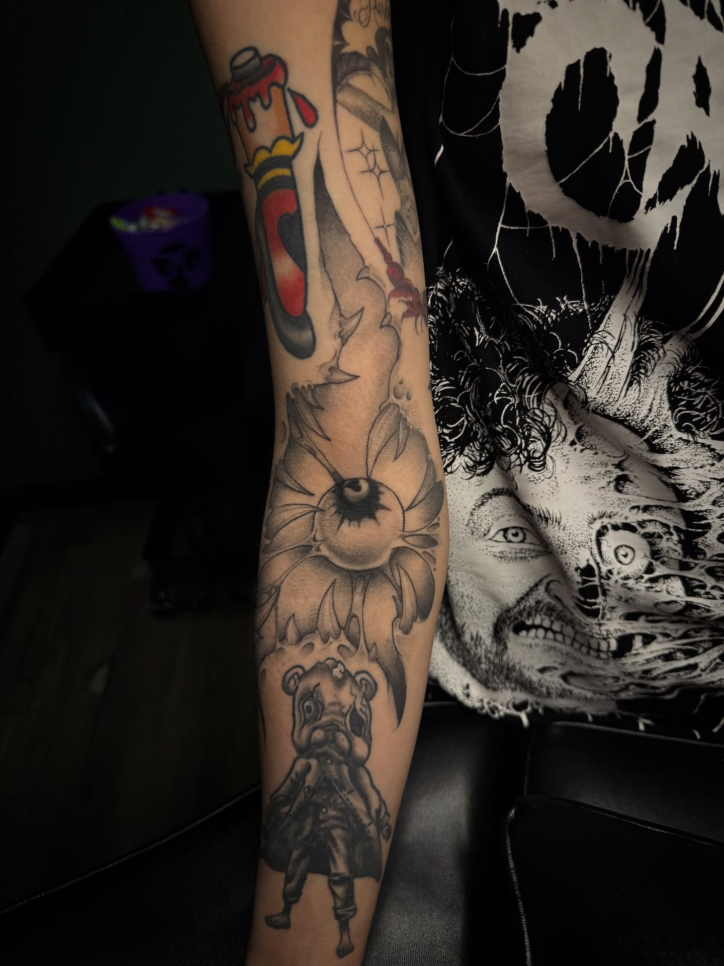 Eye and flower dotwork tattoo on the forearm by Marcus