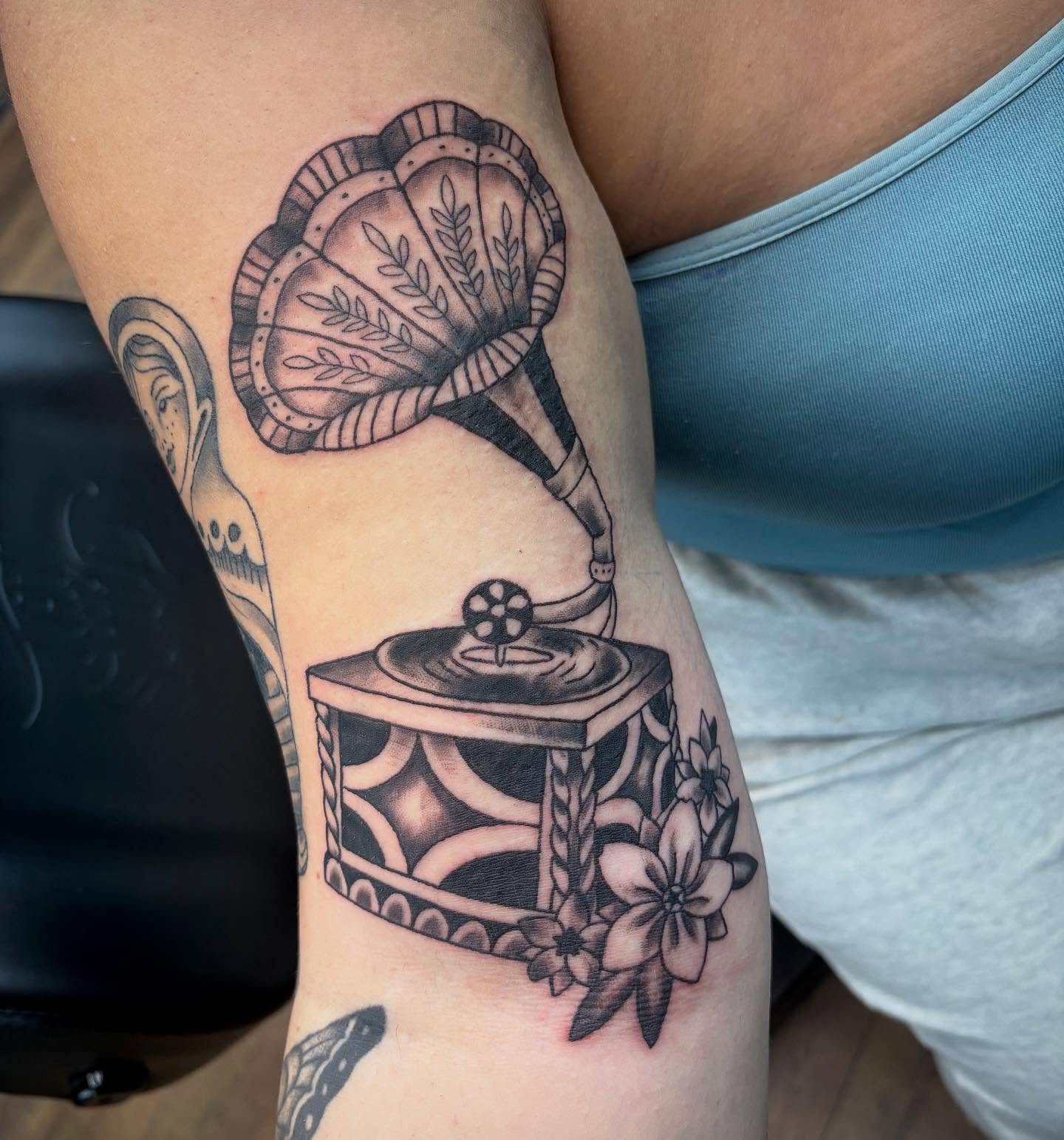 Gramophone American traditional tattoo on the forearm by Robbie Reel, Wichita, Kansas