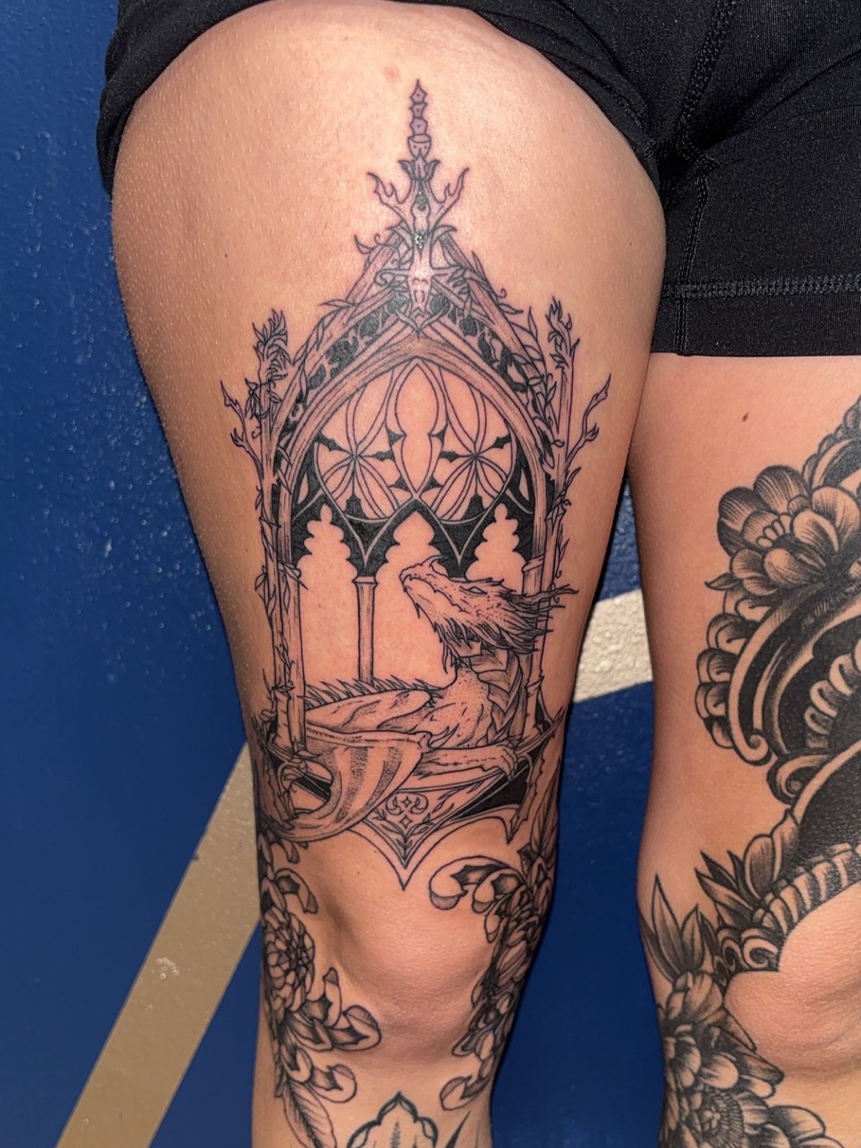 Gothic archway with dragon geometric tattoo on the thigh by ✨Cyerra Lynne✨