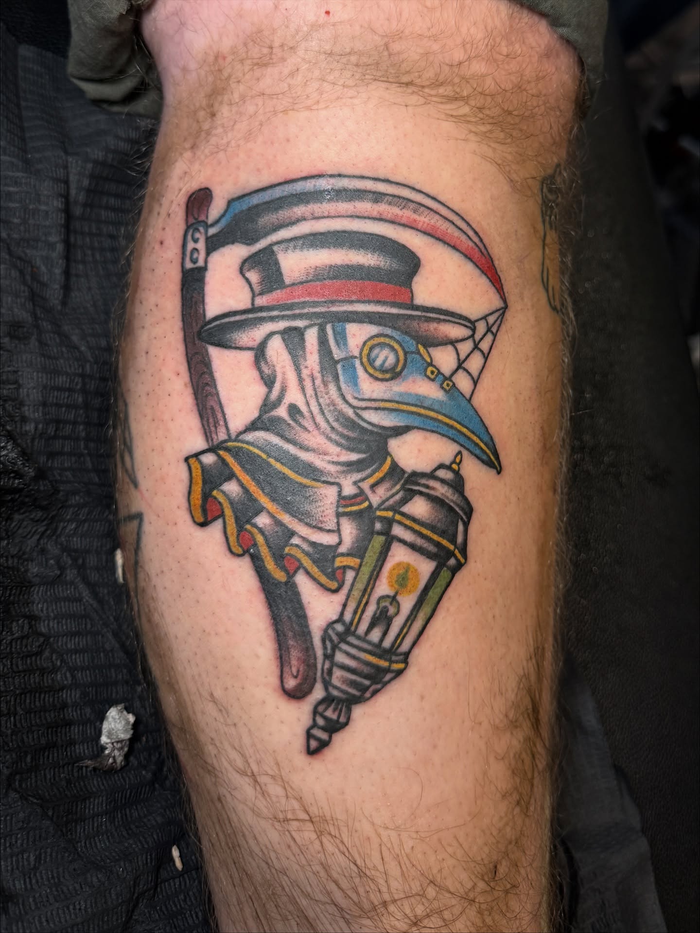 Plague doctor American traditional tattoo on the forearm by Angus Perfect, Philadelphia, Pennsylvania