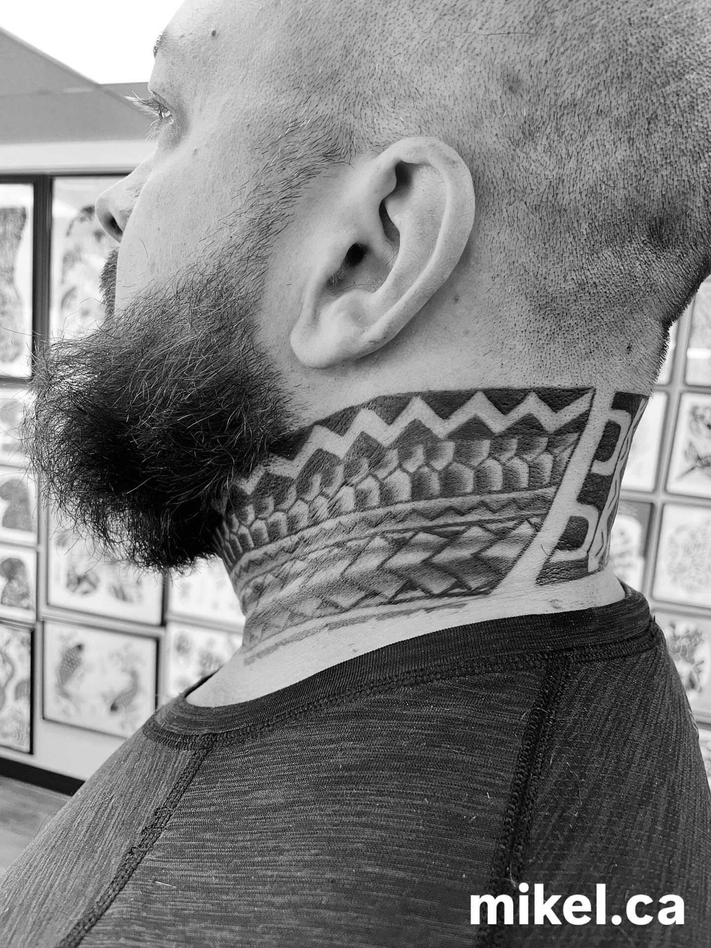 Tribal pattern tribal tattoo on the neck by mikel_tattoosangha