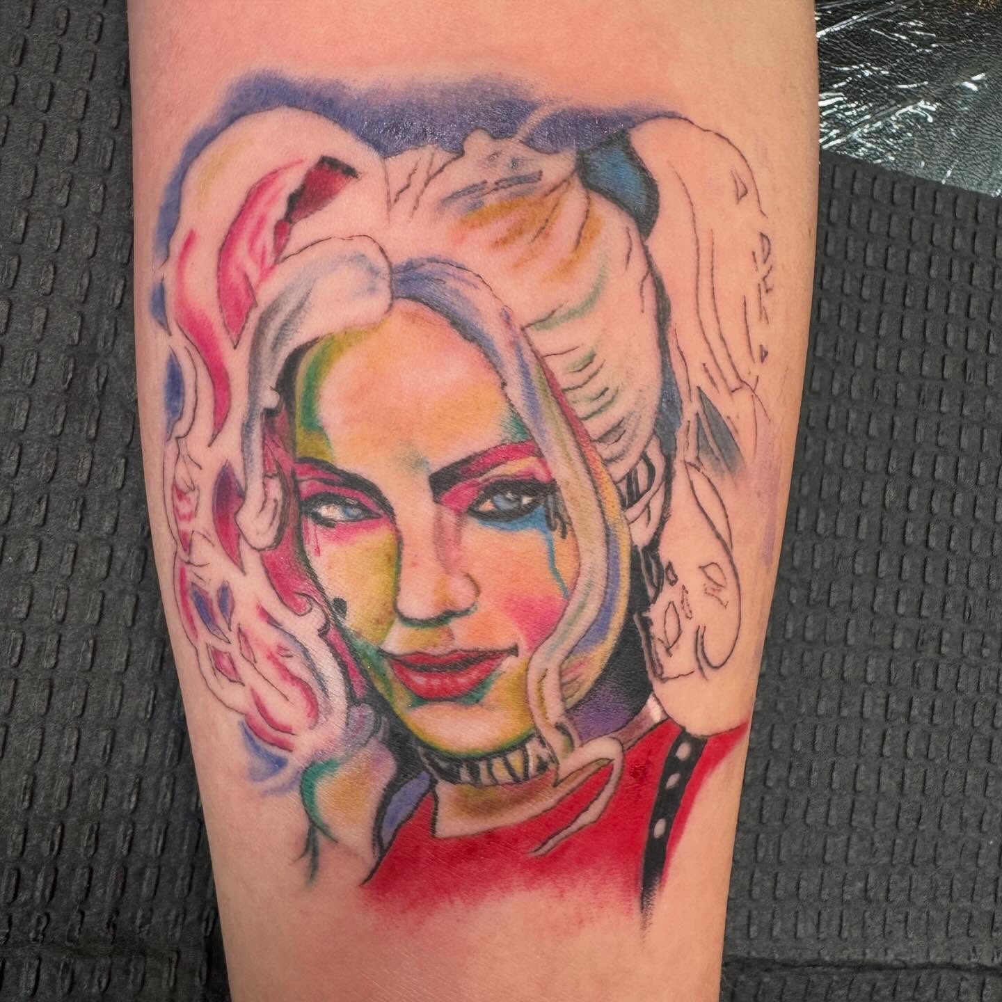 Harley Quinn new school tattoo on the forearm by spikecitytattoo