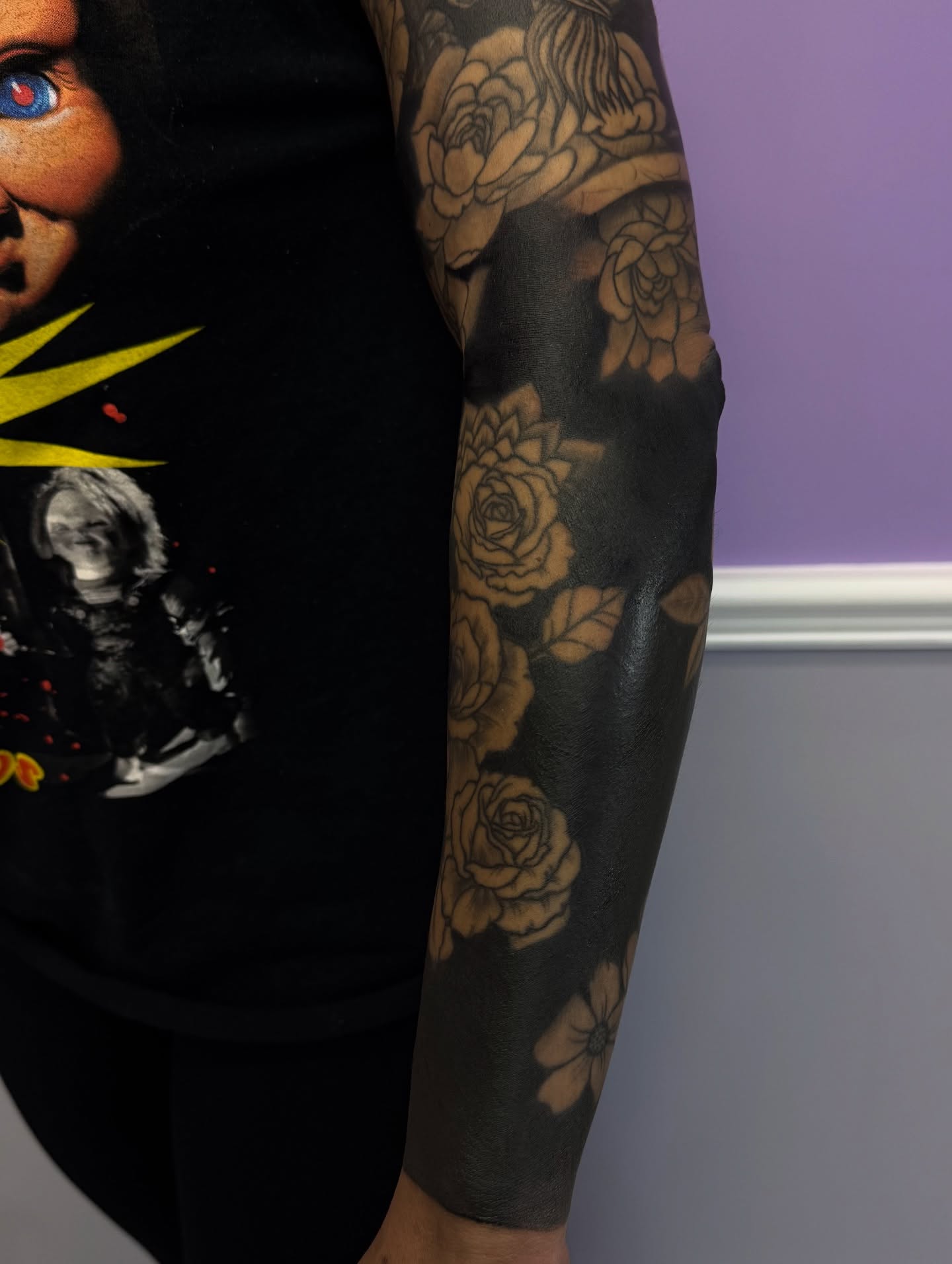Roses black and grey tattoo on the forearm by Caitlyn