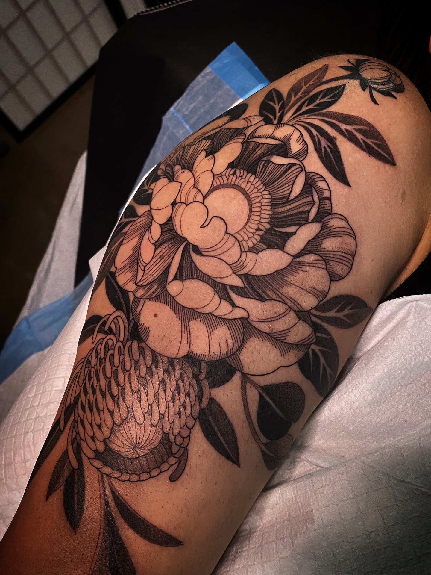 Peony flower black and grey tattoo on the forearm by Natasha Dickinson