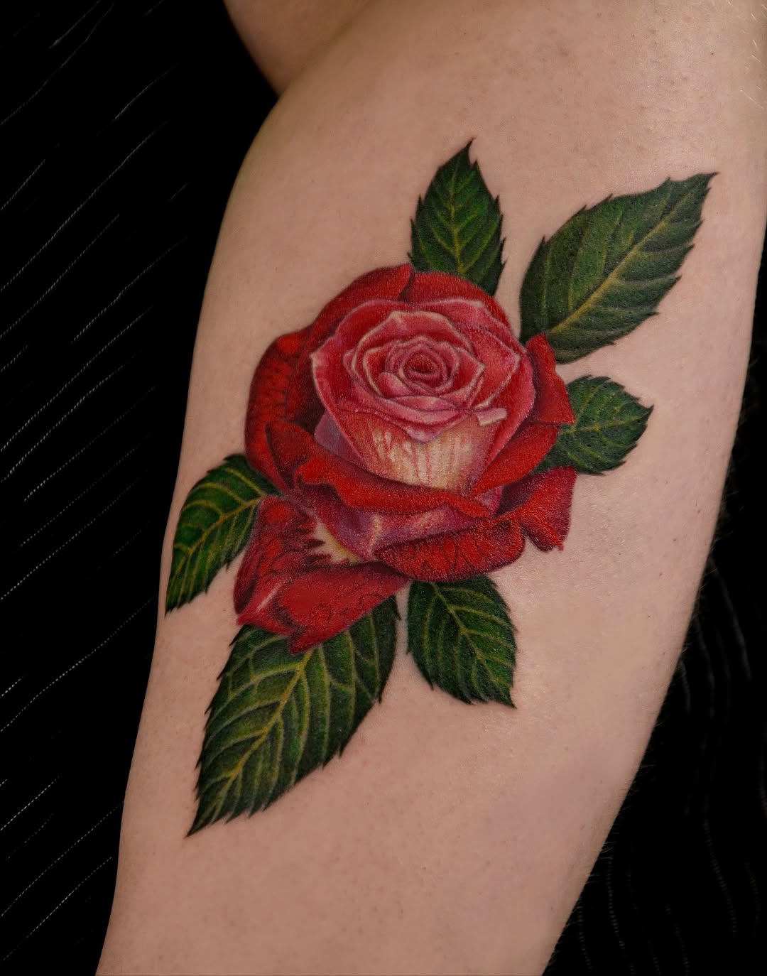 Red rose with leaves neo-traditional tattoo on the forearm by ๐ก๐ฎ๐ป๐ฐ๐ โง ๐ก๐ฌ๐ ๐ง๐๐ง๐ง๐ข๐ข ๐๐ฅ๐ง๐๐ฆ๐งโง