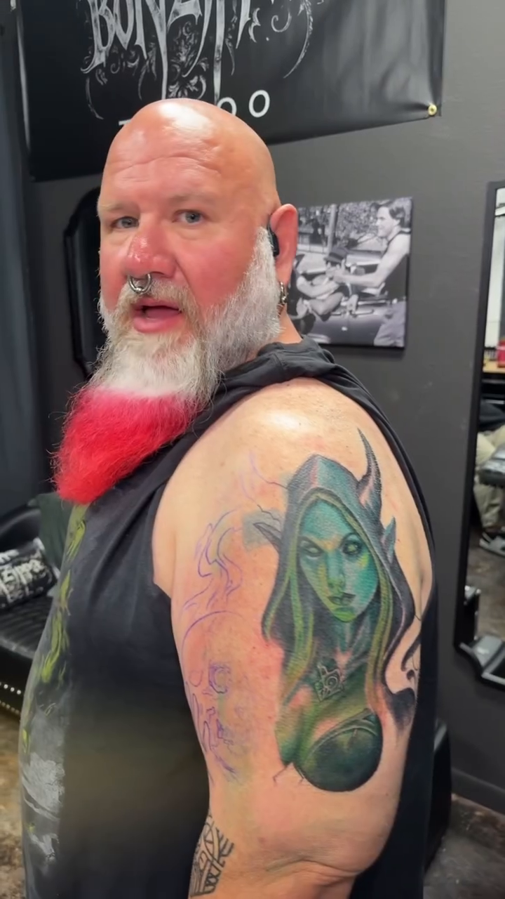 Woman with green hair realism tattoo by Eric Garcia