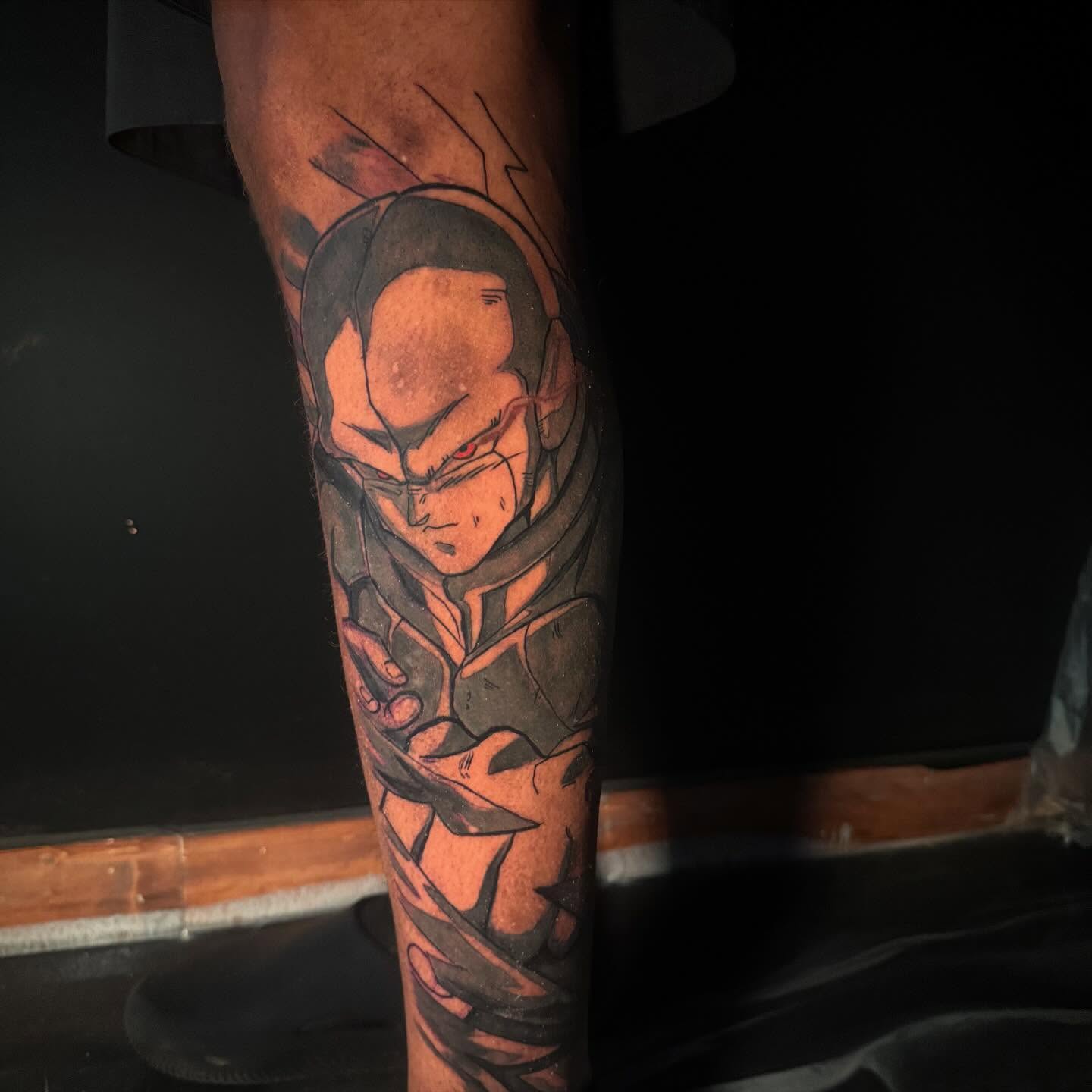 Dragon ball character anime tattoo on the forearm by Anthony Washington, Atlanta, Georgia