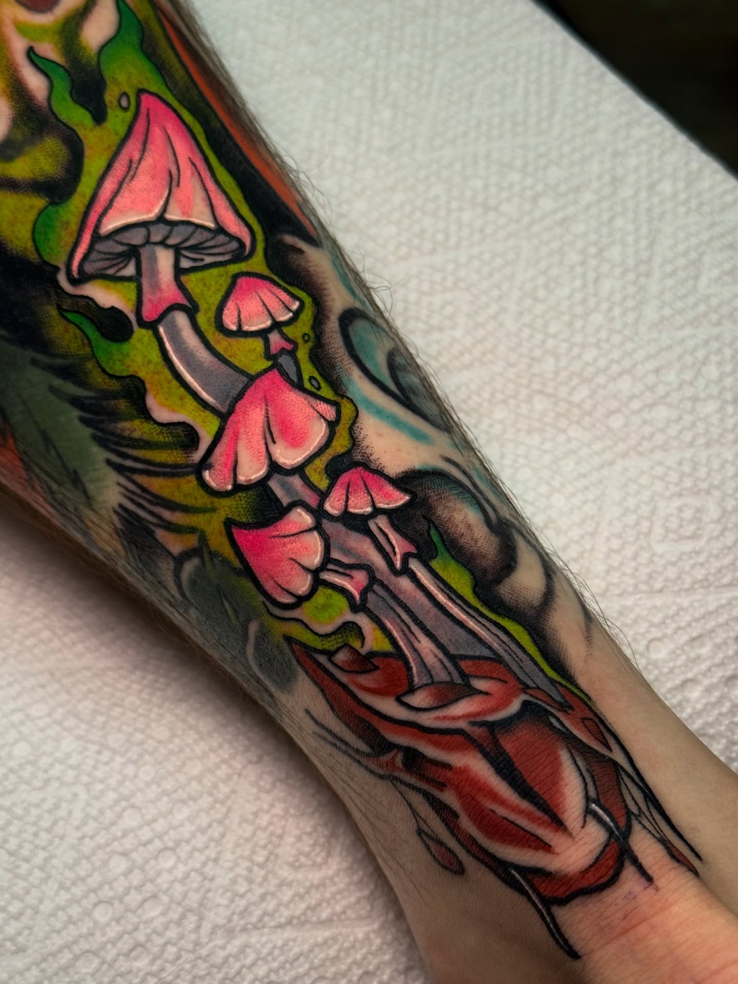 Mushroom cluster American traditional tattoo on the forearm by Cory Cartwright