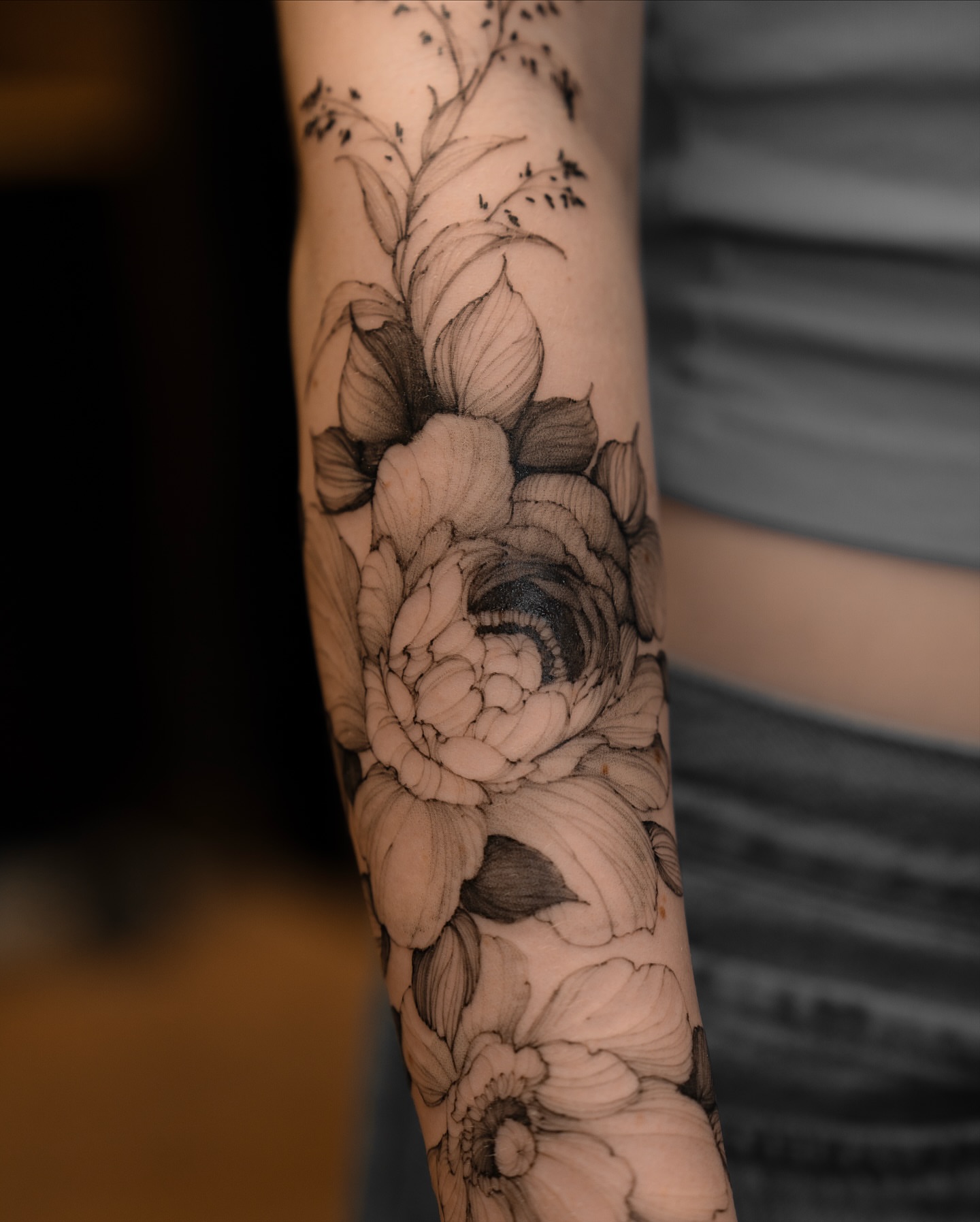Floral bouquet realism tattoo on the forearm by Marek