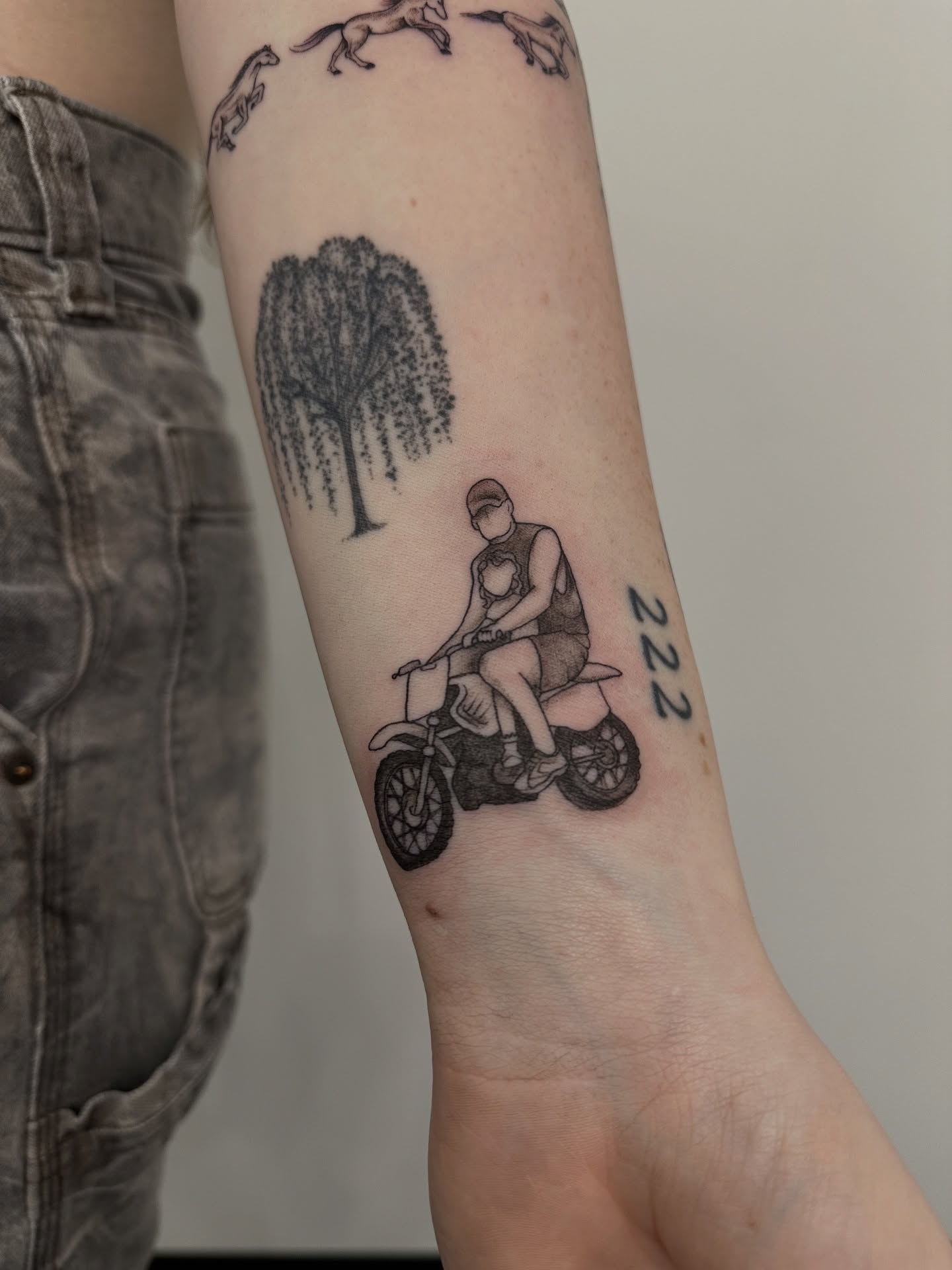 Motorcycle rider black and grey tattoo on the forearm by ๐ฌ๐๐๐ฏ๐ ๐ฆ ๐๐ฉ๐ฆ๐ท๐๐๐ข๐ฑ๐ฅ ๐ซง๐ผ, Joplin, Missouri