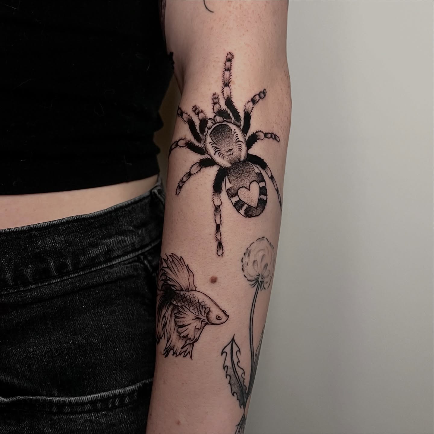 Spider, fish, flower black and grey tattoo on the forearm by ˖.𖥔 ݁˖anna hoffman˖ ⊹ ࣪ ˖, Salt Lake City, Utah