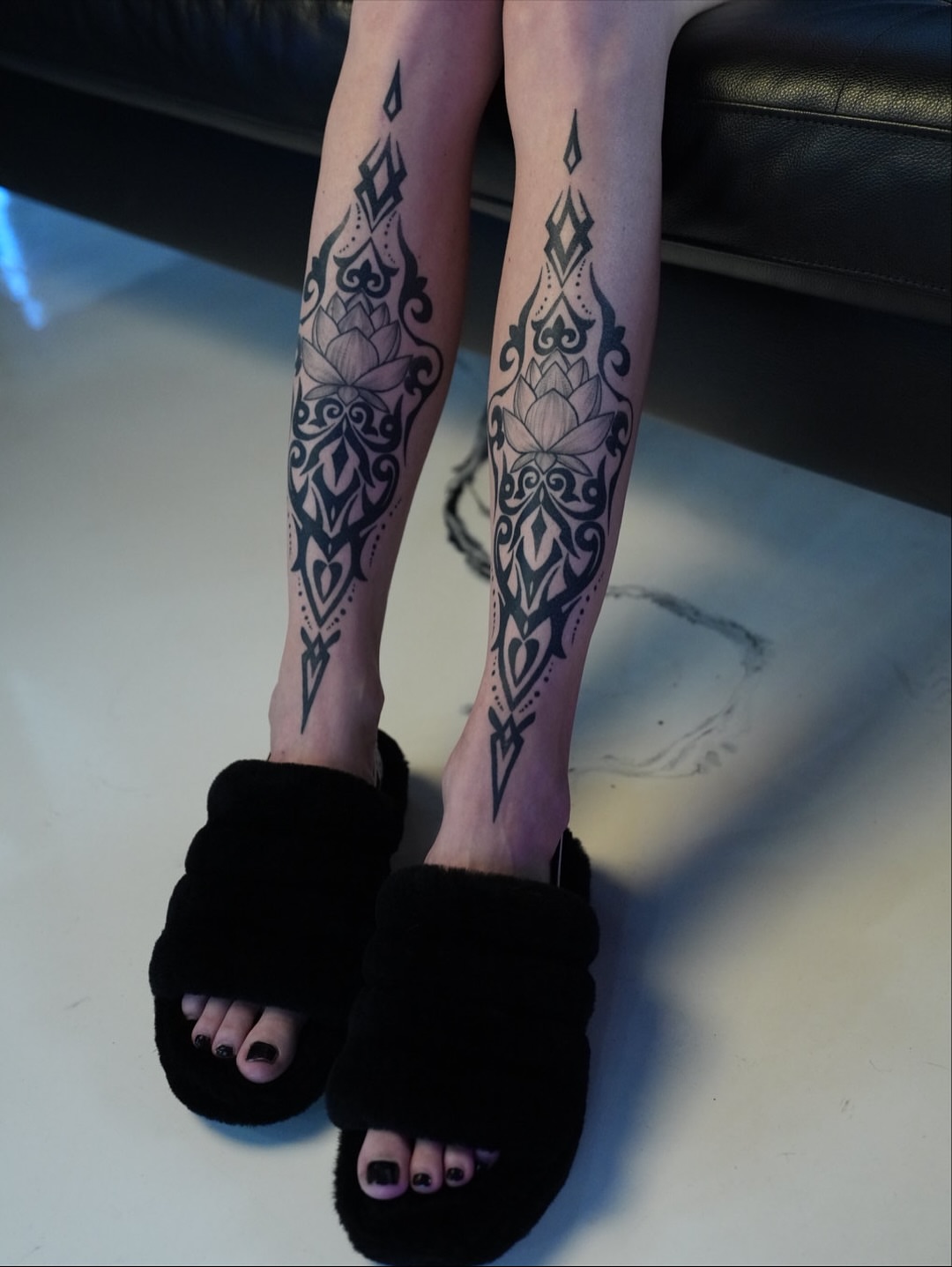 Lotus flower tribal tattoo on the calf by ⓝⓐⓘⓡⓐⓓⓞⓣⓢ