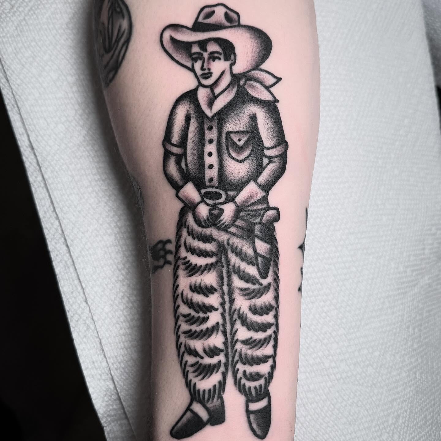 Cowboy American traditional tattoo on the forearm by Zach Roman, Madison, Wisconsin