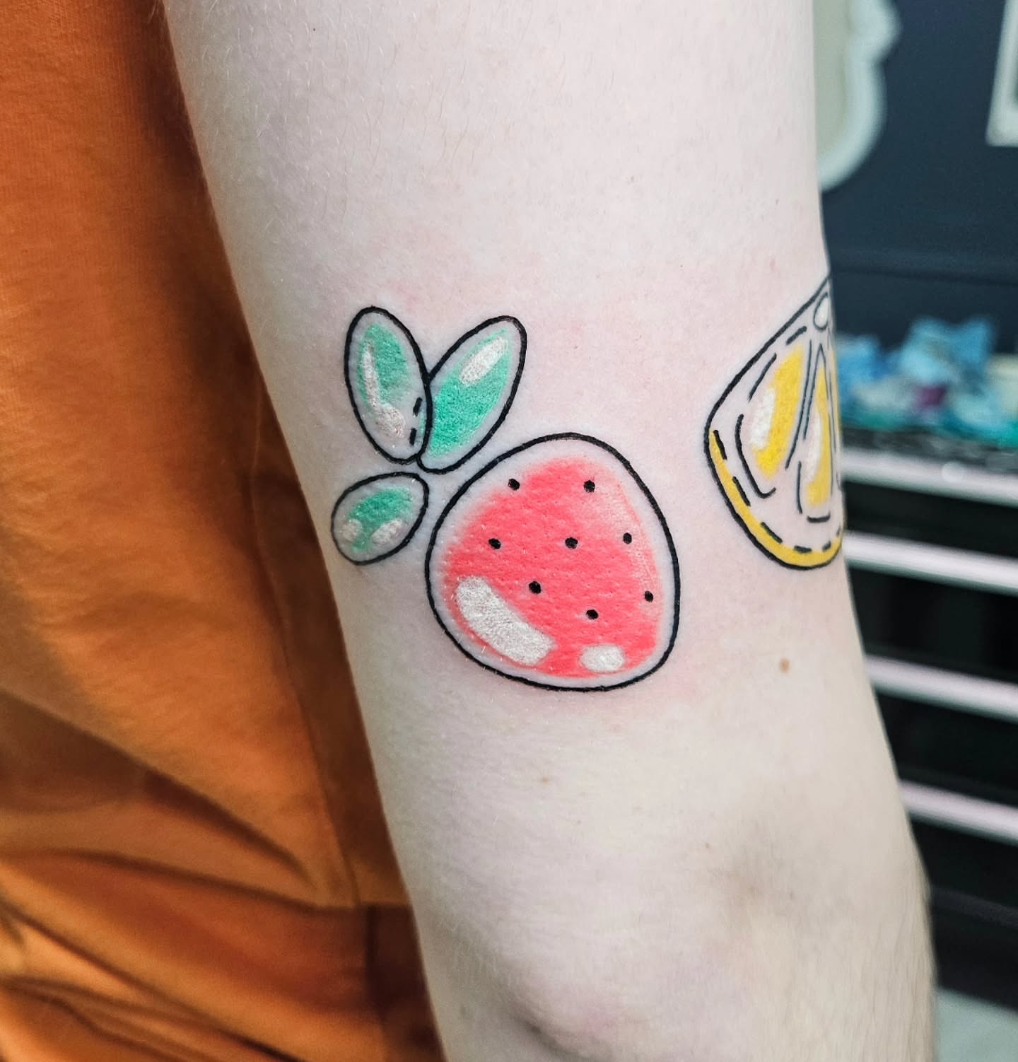 Watermelon slice dotwork tattoo on the forearm by Gray