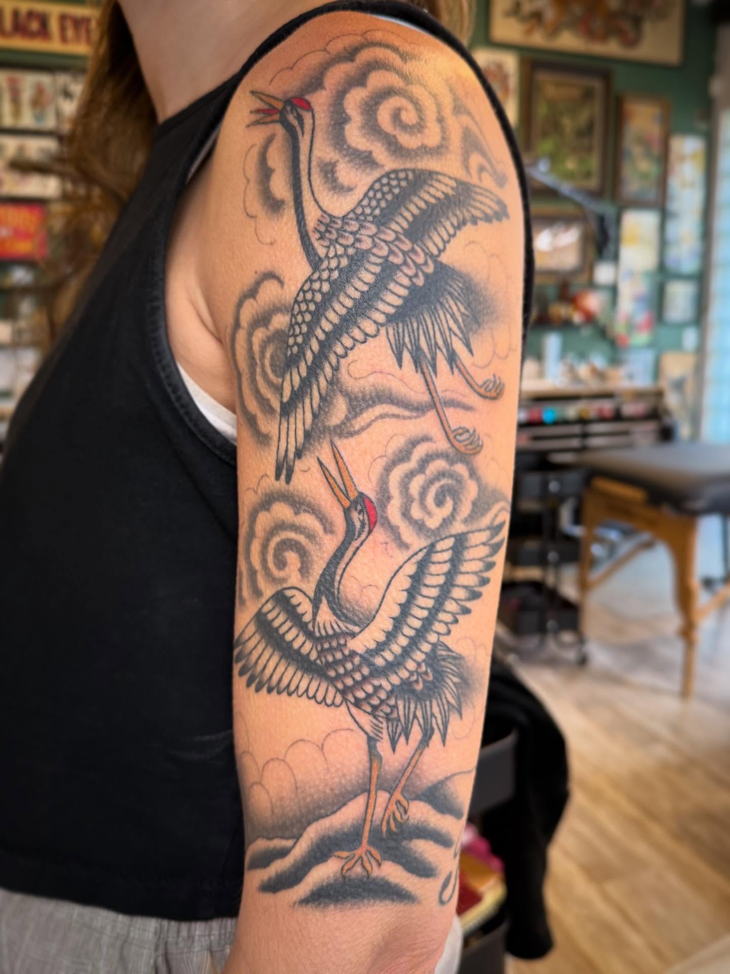 Cranes American traditional tattoo on the forearm by Collin Rigsby, Minneapolis, Minnesota