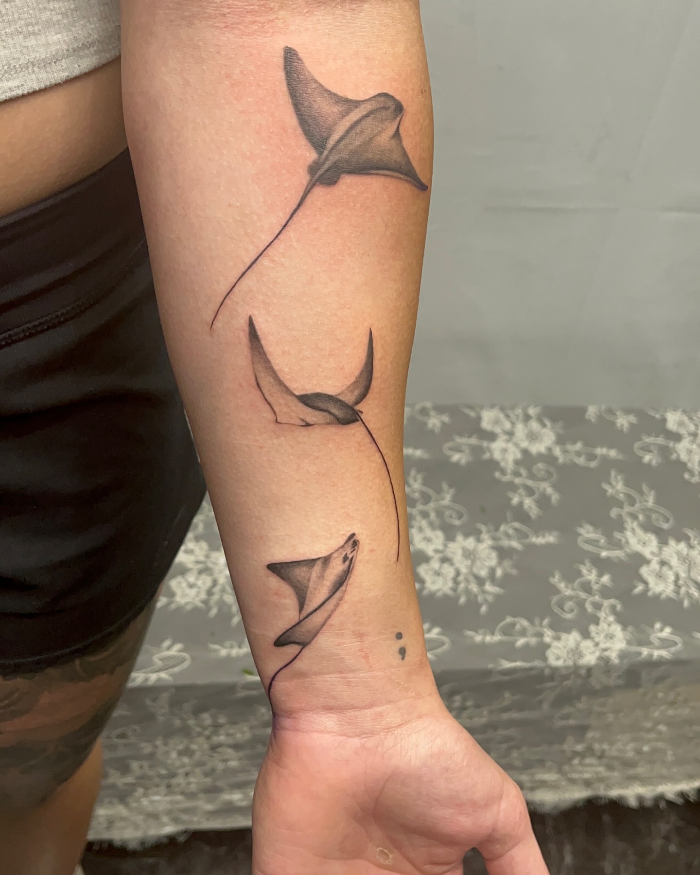 Ray fish black and grey tattoo on the forearm by Ryan Hindenach