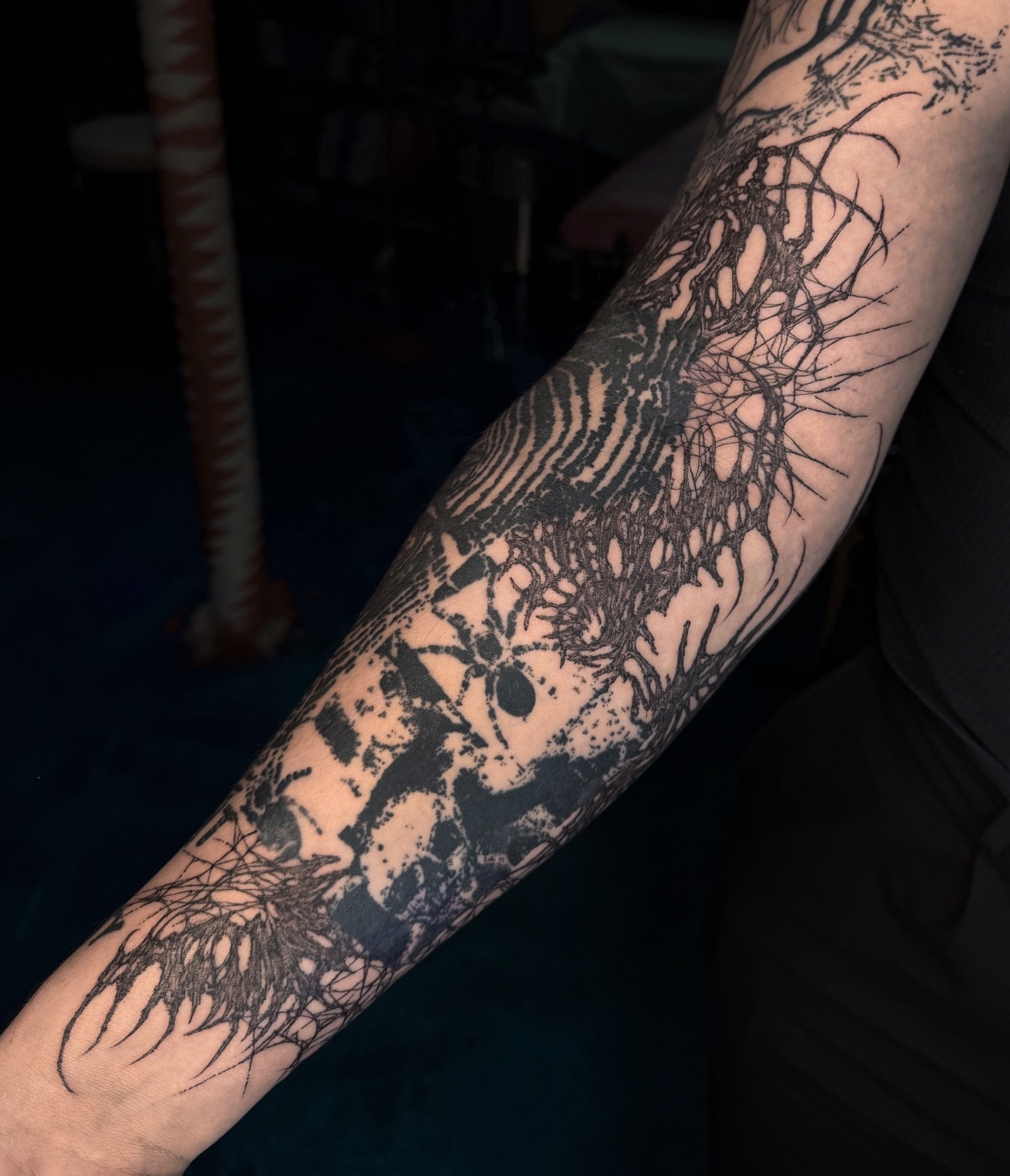Abstract nature dotwork tattoo on the forearm by Penelope
