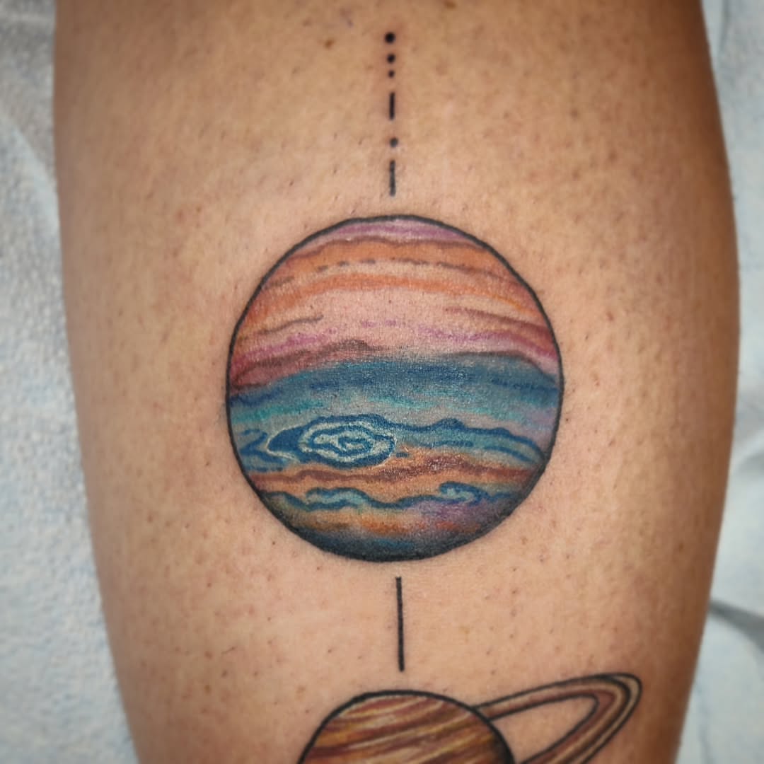 Jupiter dotwork tattoo on the leg by Julie MacDonald