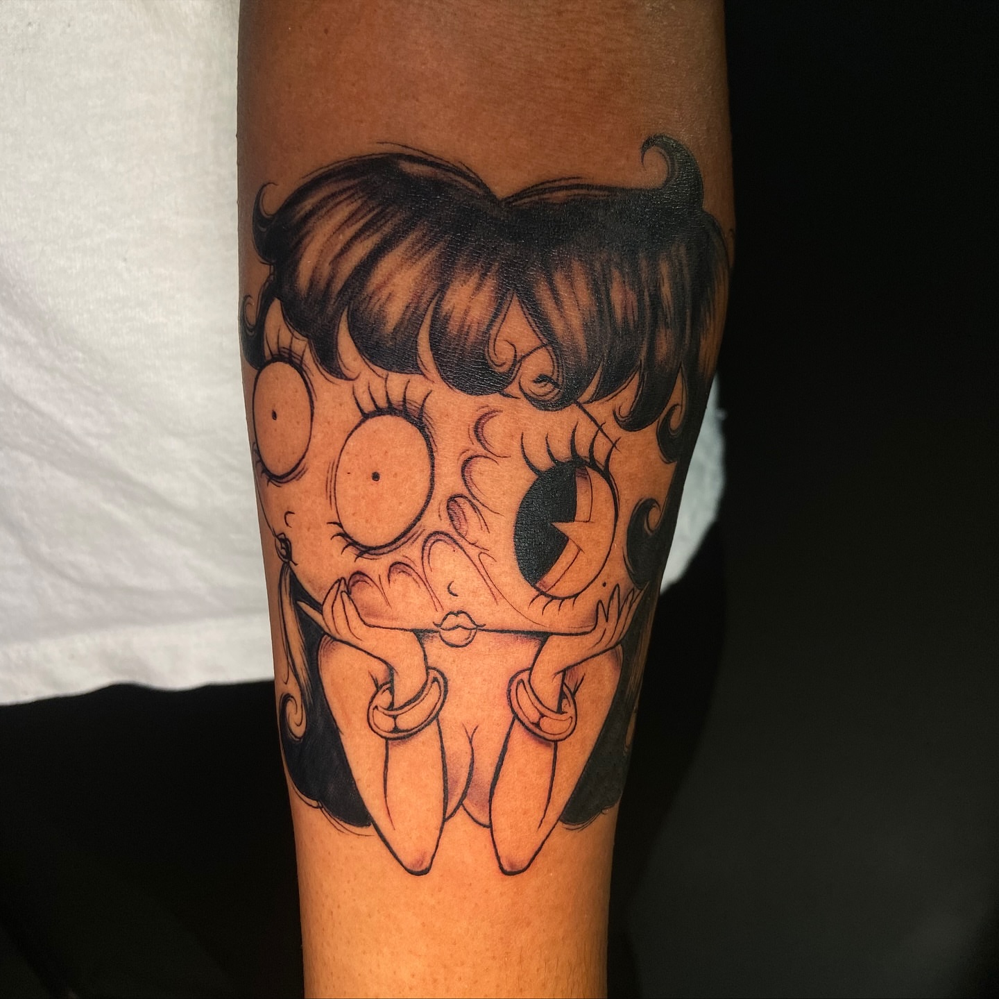 Betty Boop black and grey tattoo on the forearm by Chicago Tattoo Artist