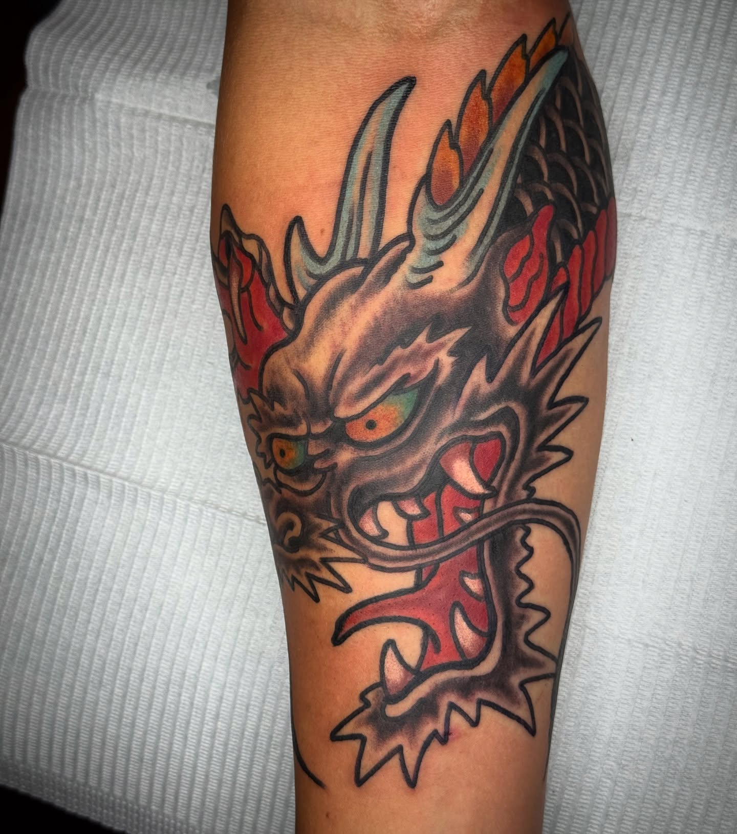 Dragon japanese irezumi tattoo on the forearm by Dustin Paul Fowler, New York, New York