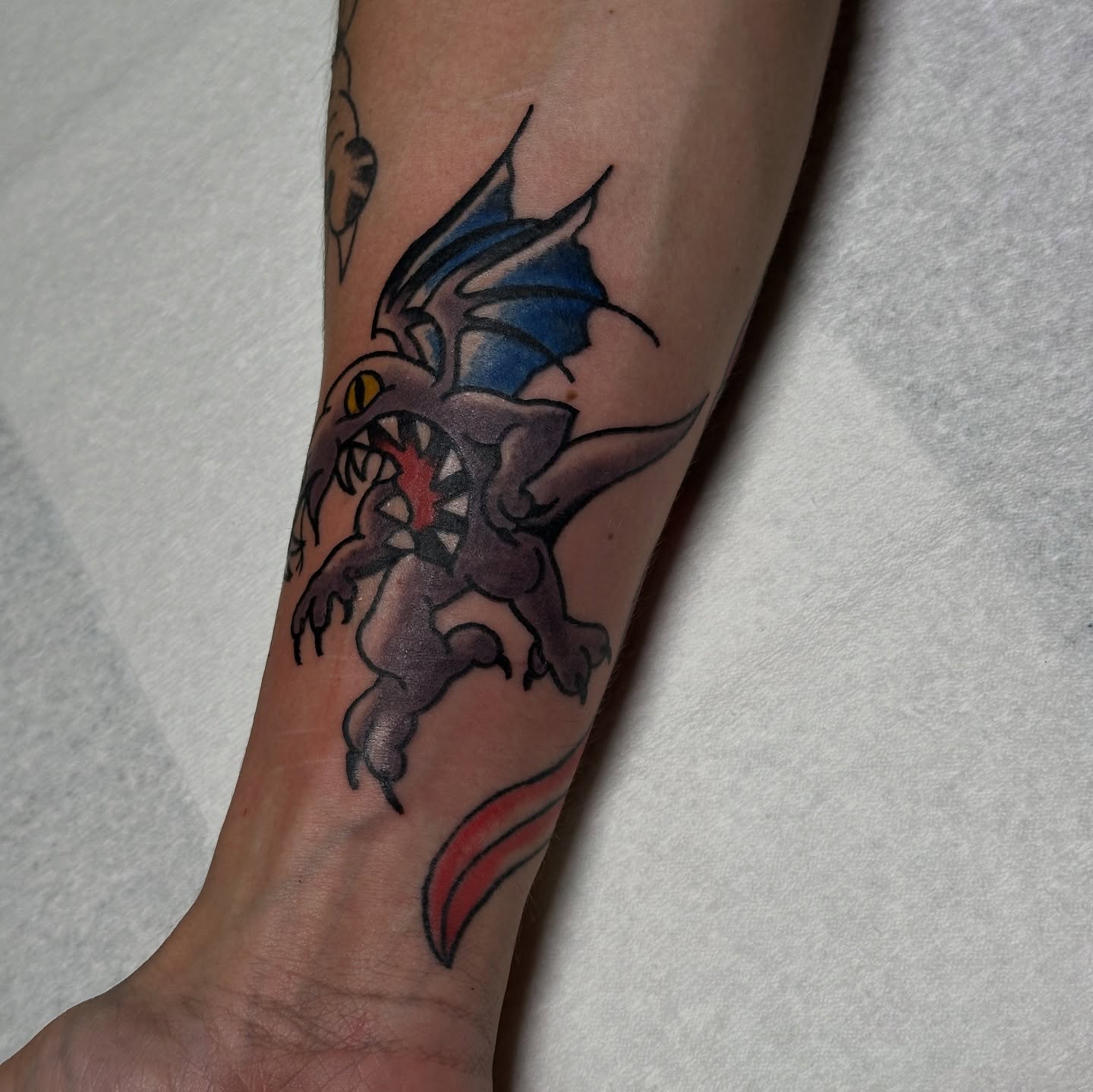 Dragon American traditional tattoo on the forearm by Gabriel F Kingston Beitia