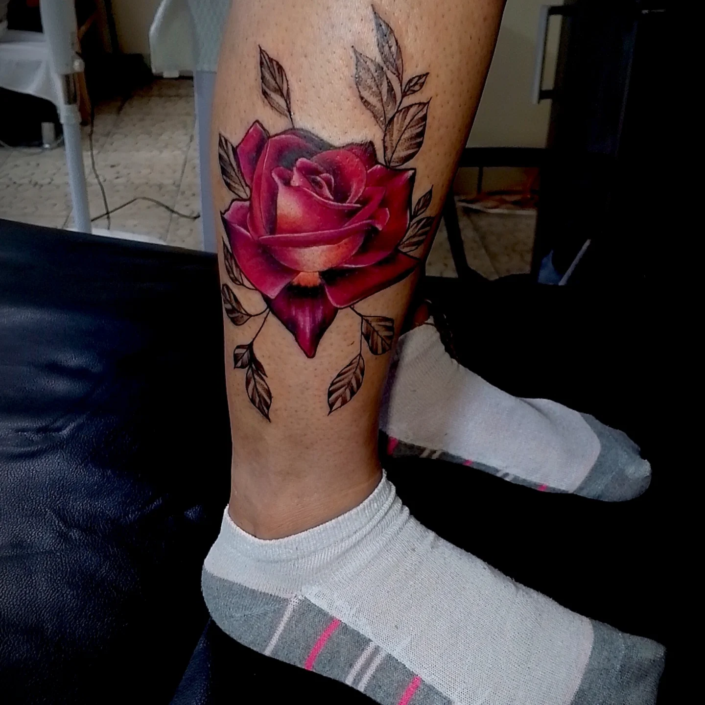 Rose realism tattoo on the forearm by Alexander Tattooink