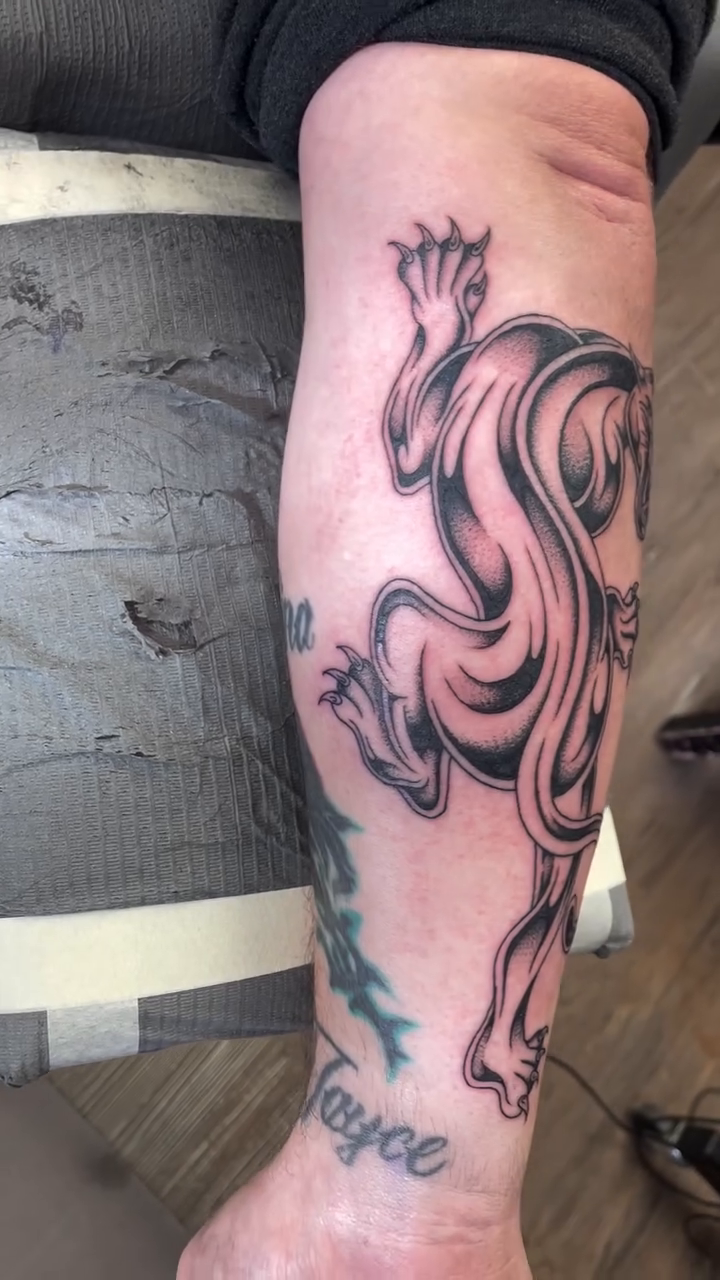 Panther tattoo realism tattoo on the calf by Brayden P Tattoo