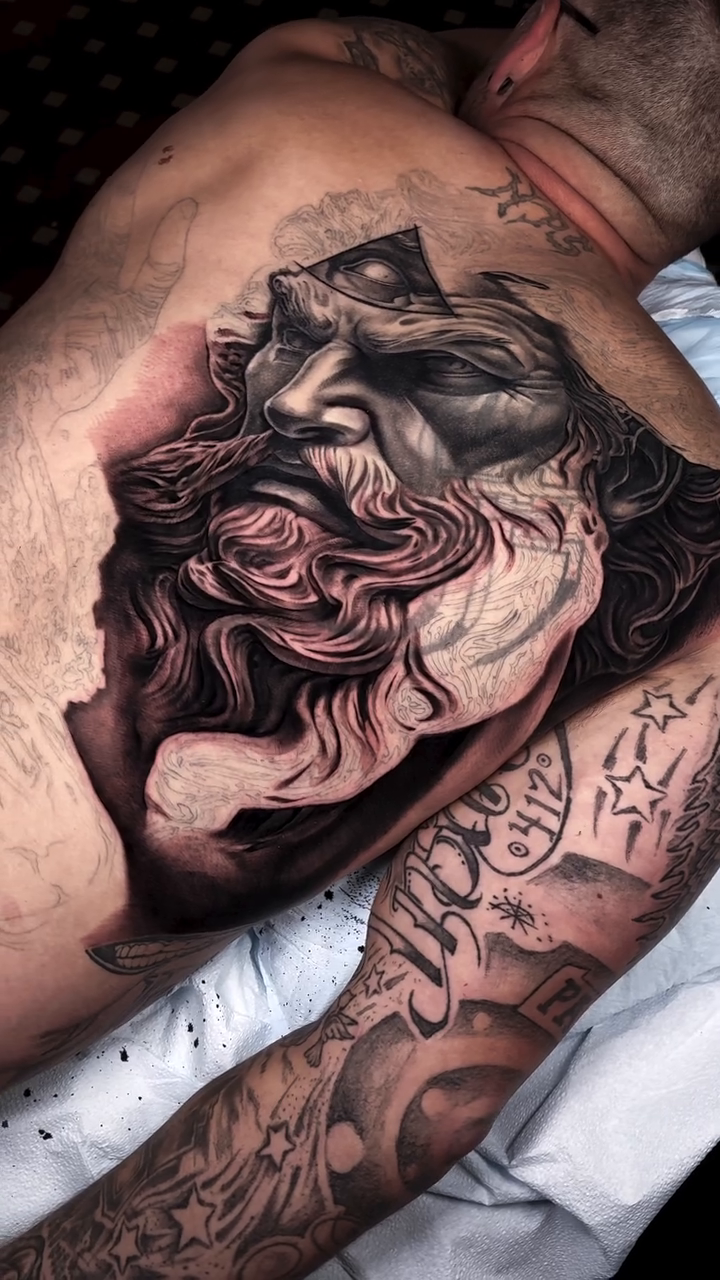 Tattoo by @sethholmestattoos — realism, black_and_grey
