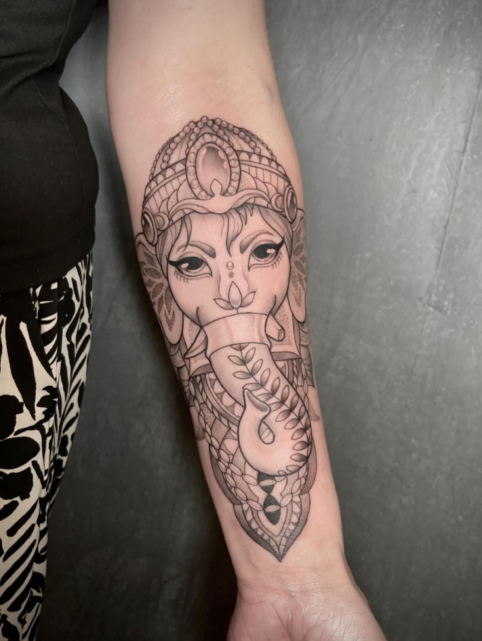 Elephant woman ornamental tattoo on the forearm by Zac Byrd