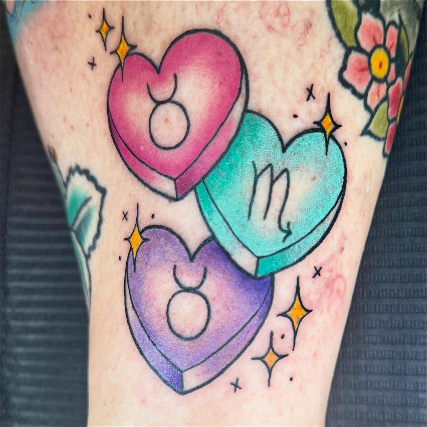 Hearts American traditional tattoo on the forearm by Zakariah⚡️🏳️‍⚧️✨