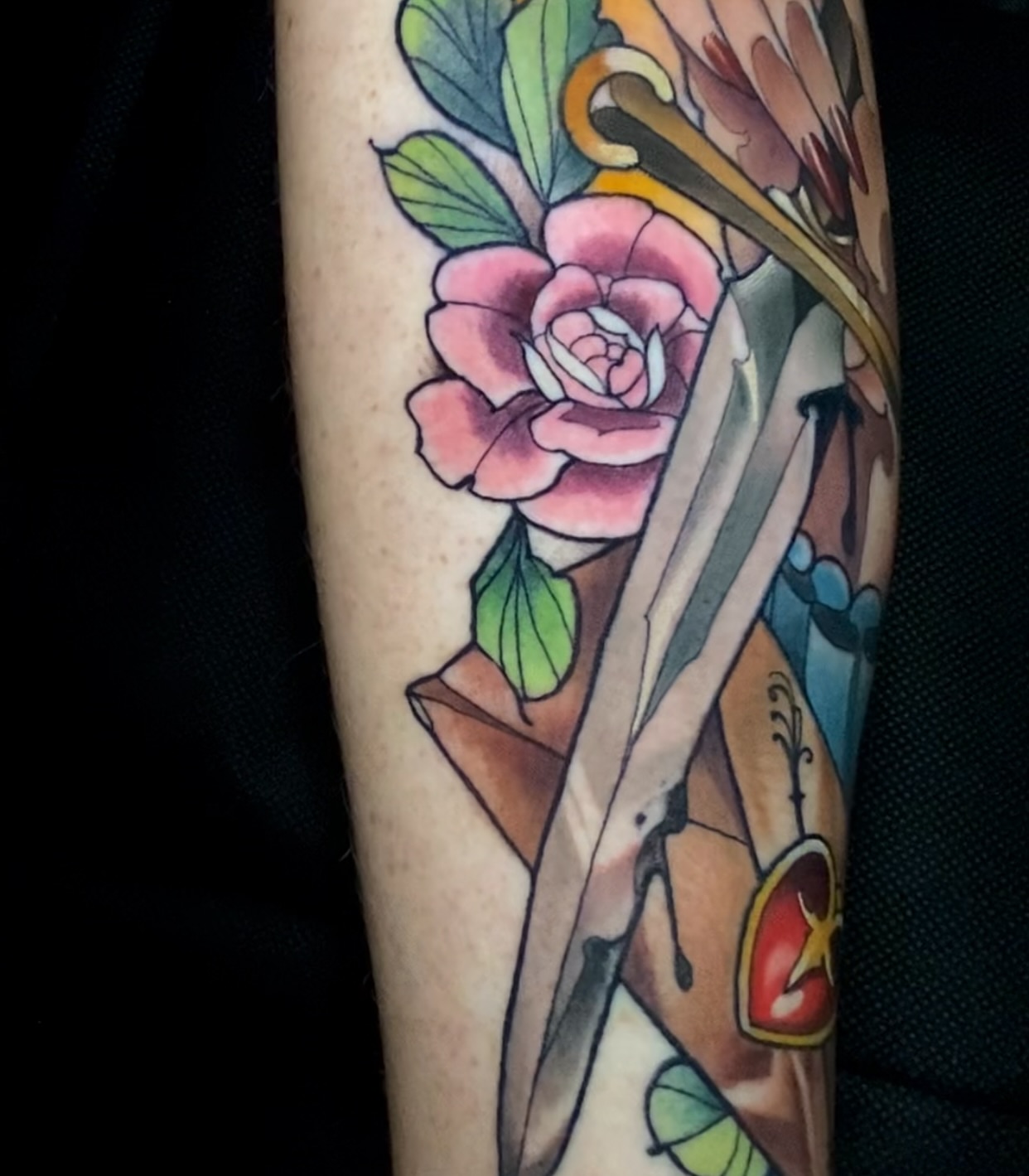 Bow and rose American traditional tattoo on the forearm by ＊ 𝙴𝚁𝙸𝙺𝙰 𝚆𝙷𝙸𝚃𝙴 ＊ 𝙱𝙻𝚄𝙴 𝚃𝙾𝚁𝙲𝙷 𝚃𝙰𝚃𝚃𝙾𝙾