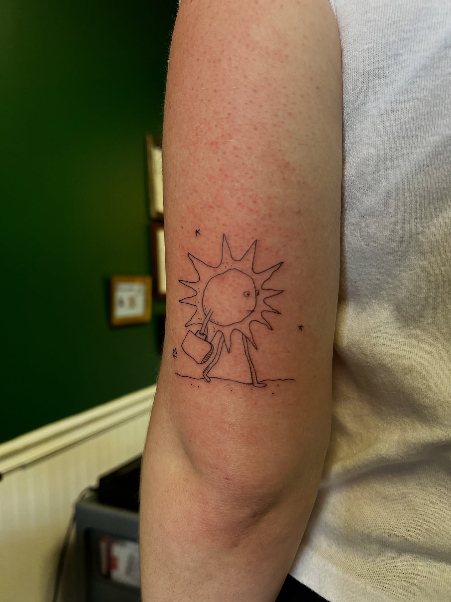 Sun minimalist tattoo on the forearm by Cortnie, Nashville, Tennessee