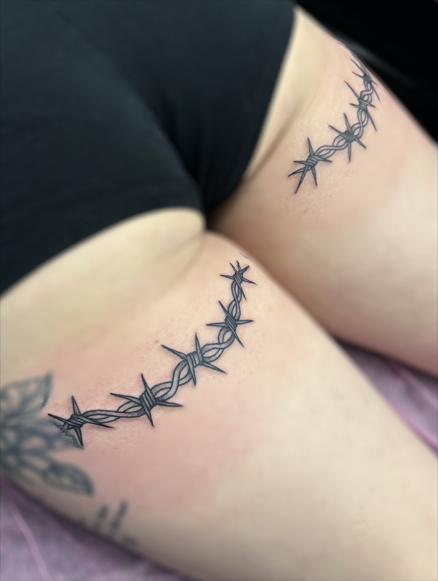 Barbed wire black and grey tattoo on the upper arm by ✿ sadie winter ✿