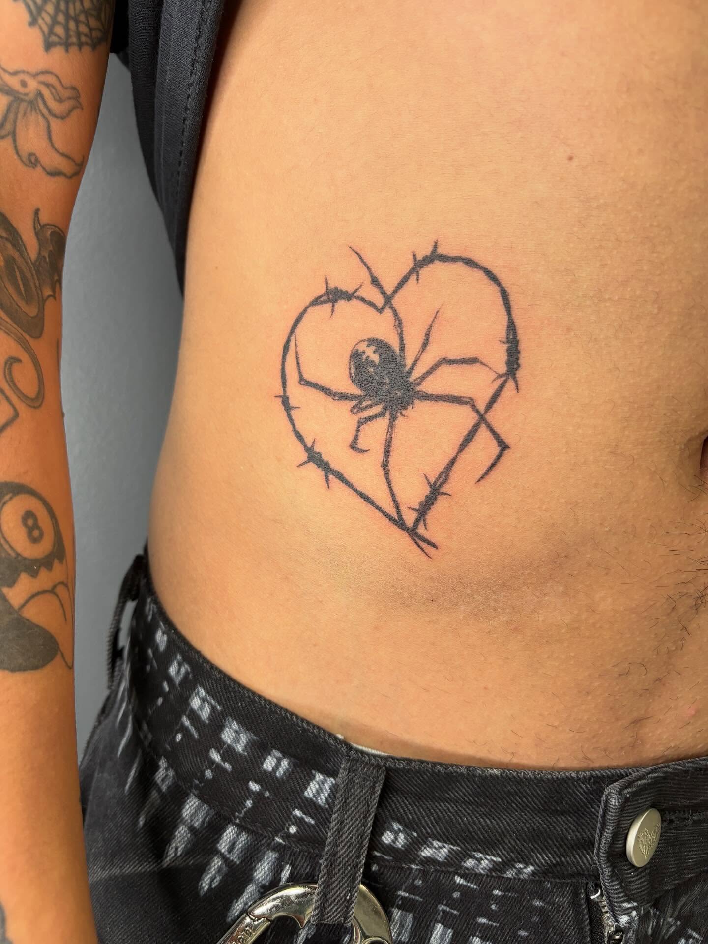 Spider in heart black and grey tattoo on the ribs by ꜱʜɪʀʟᴇʏ