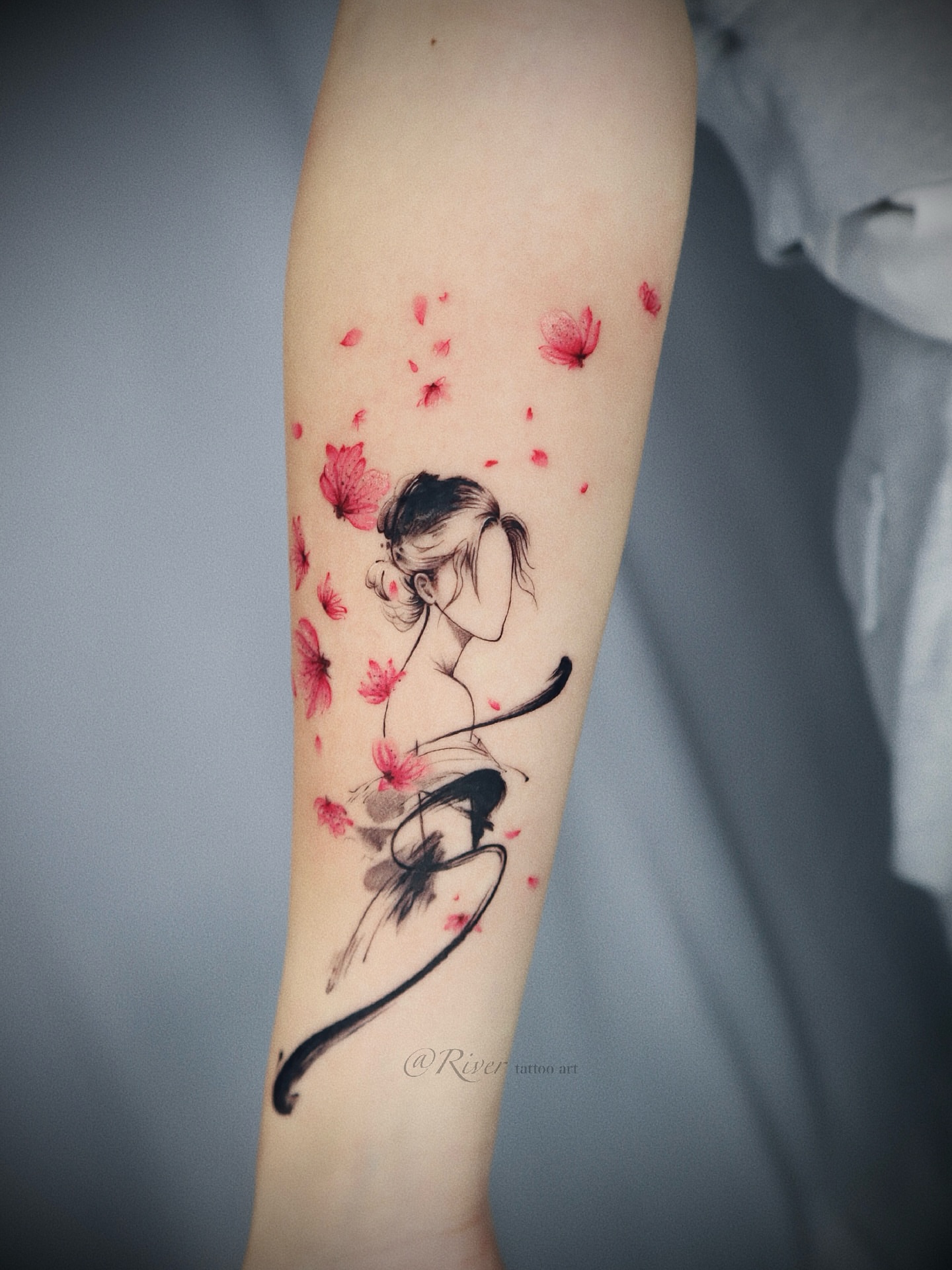Cherry blossom girl watercolor tattoo on the forearm by River