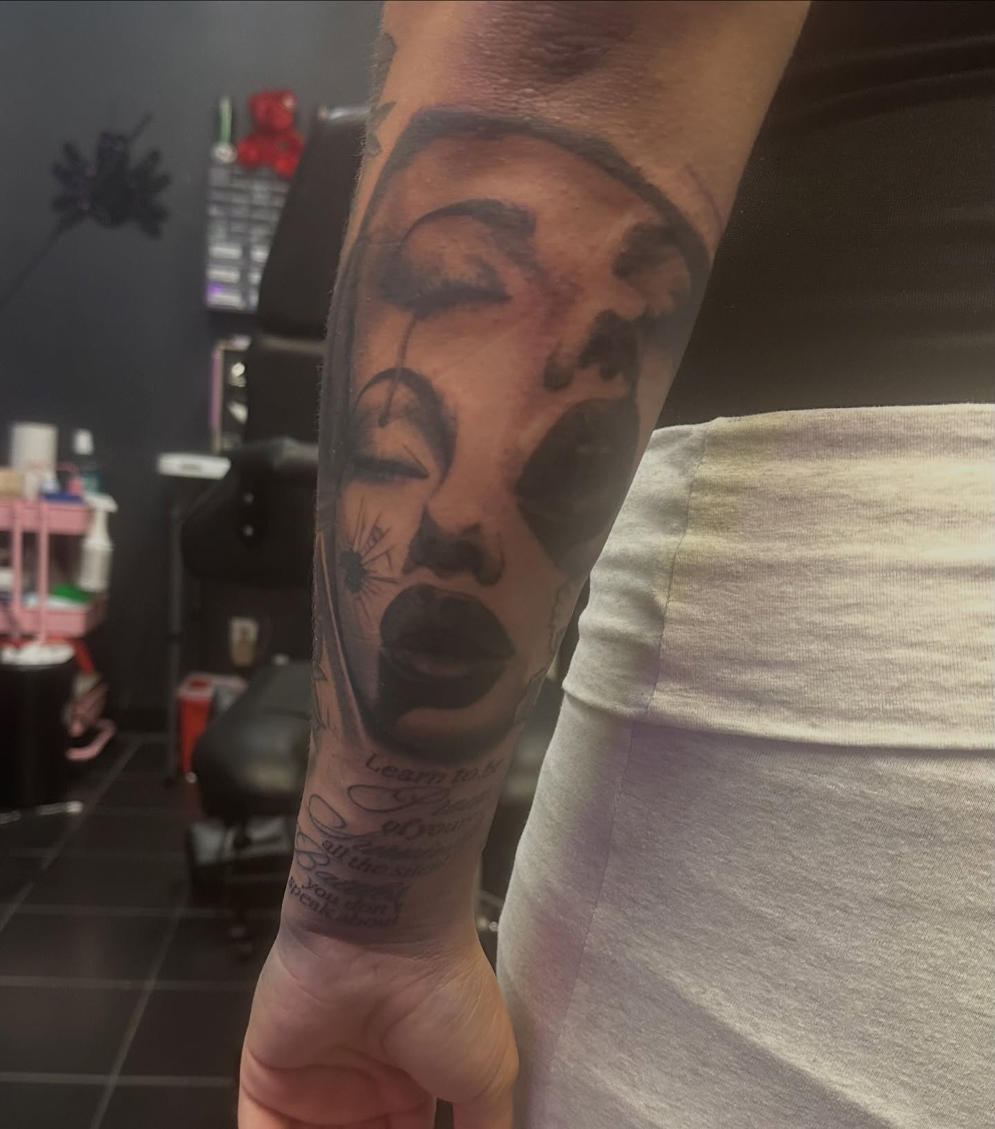Woman's face realism tattoo on the forearm by Carly🪲 greensboro tattoo artist, Greensboro, North Carolina