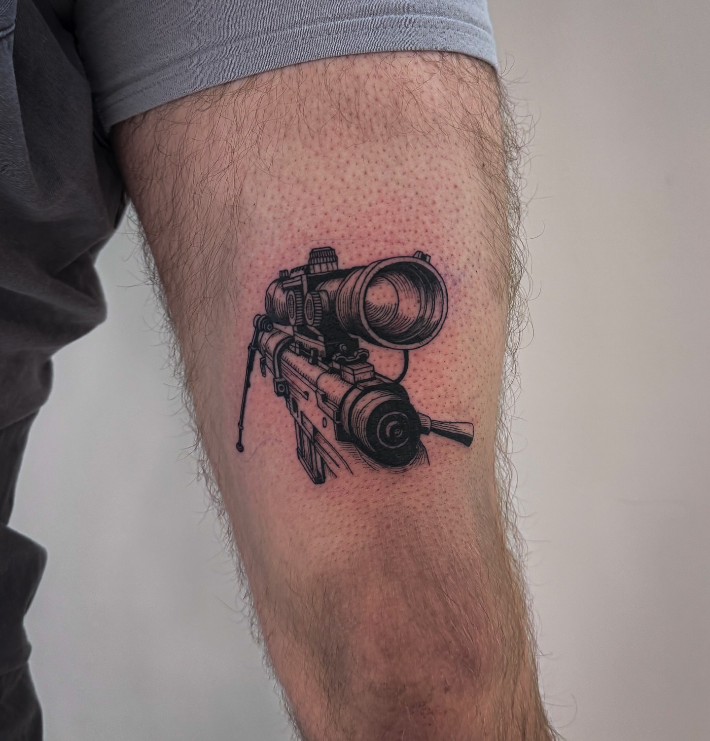Sniper rifle dotwork tattoo on the thigh by utah tattoo artist