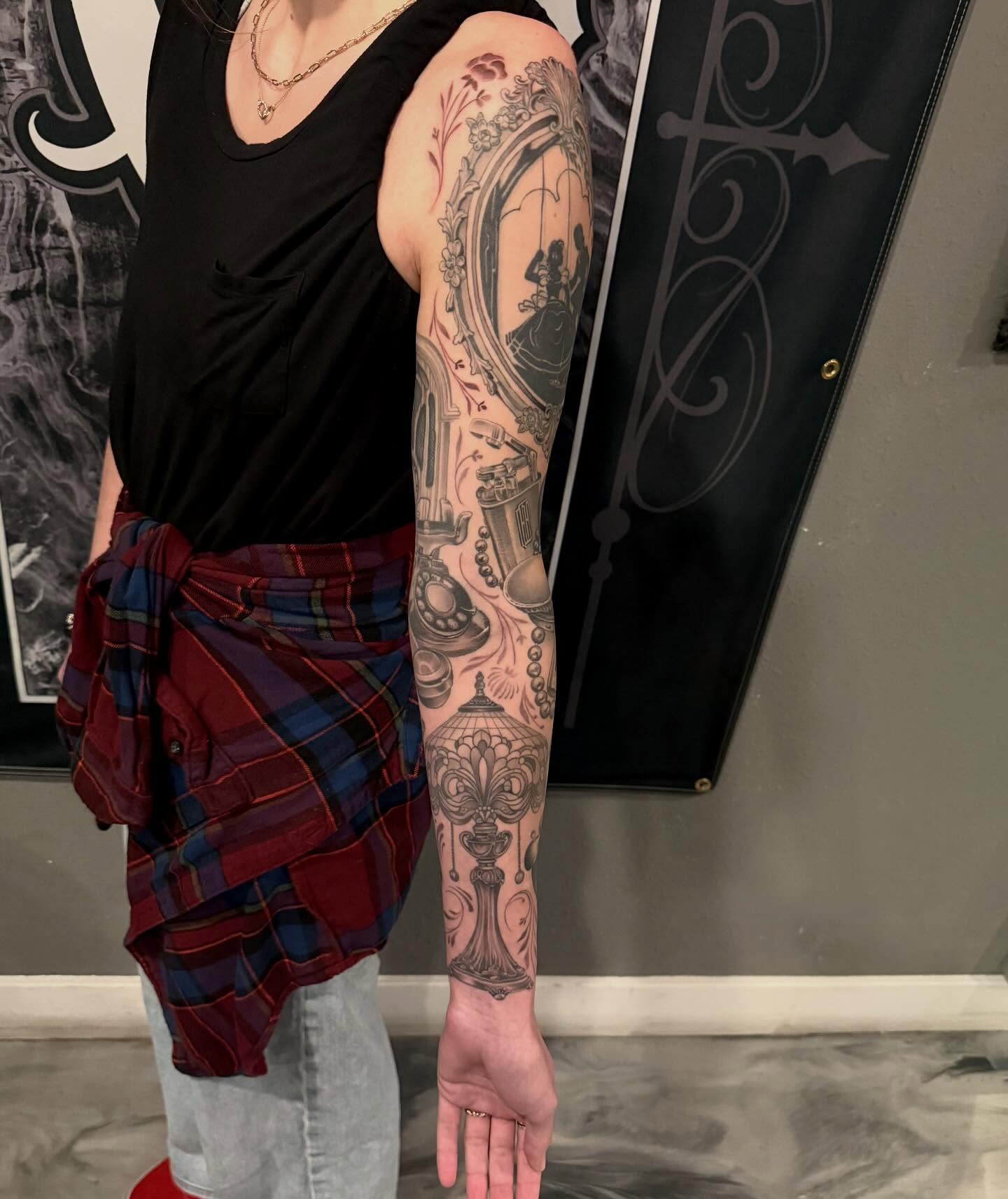 Clock and woman black and grey tattoo on the forearm by Cody Pappas