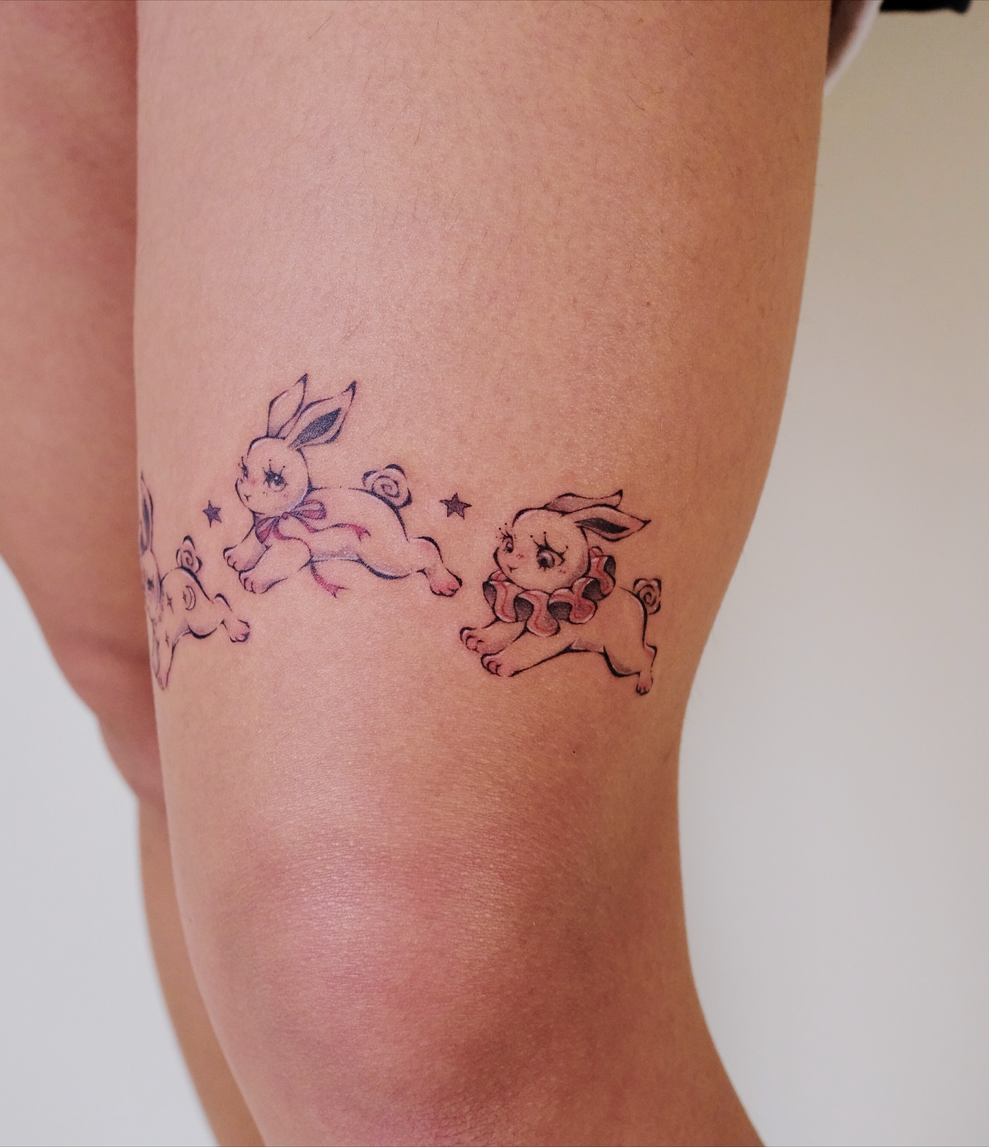 Rabbits new school tattoo on the thigh by ââŪ. Ý ðķðð―ððð âðĶđËâ seattle tattoo artist, Seattle, Washington