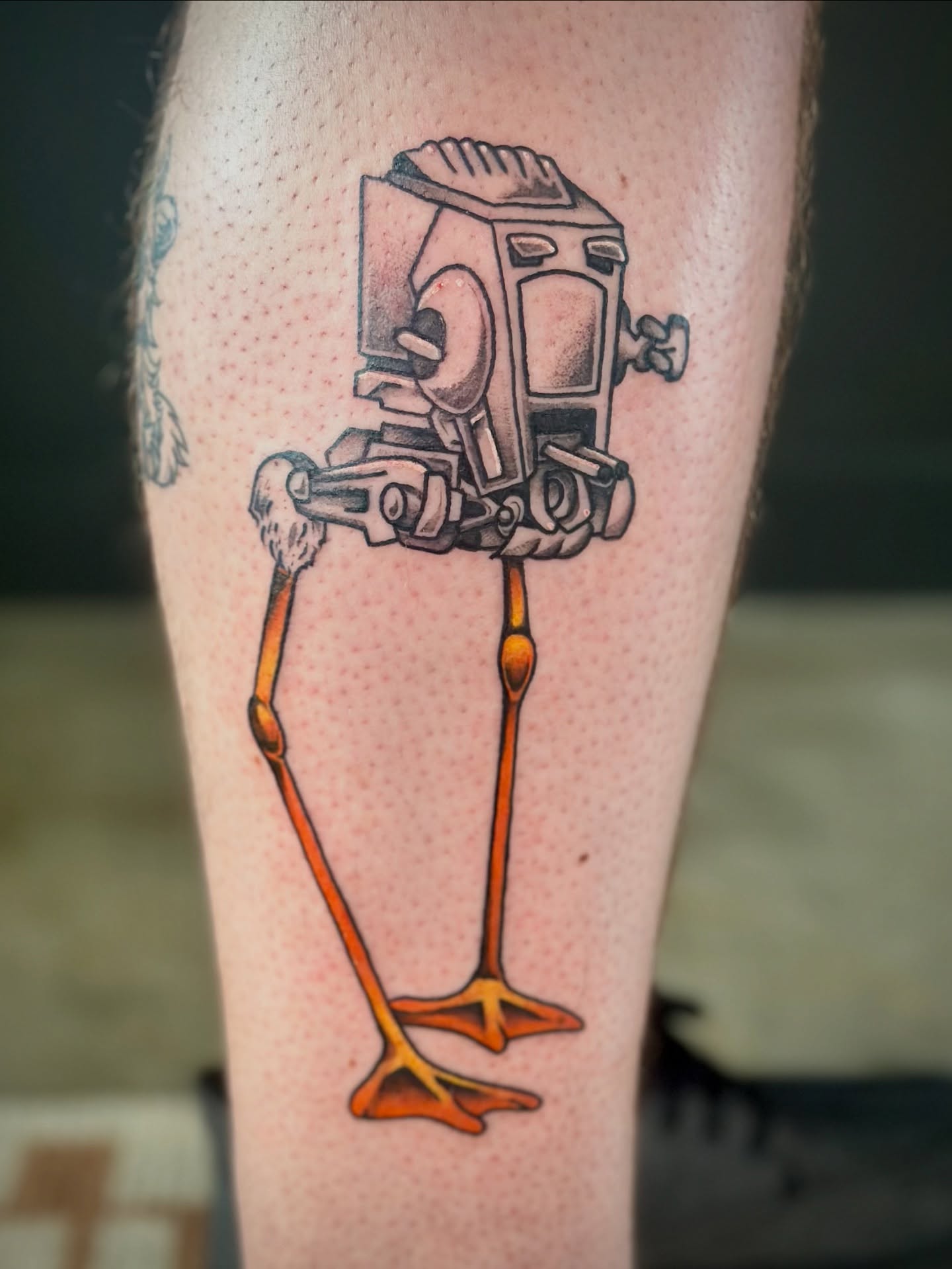 Robotic bird geometric tattoo on the thigh by Maddie Morrill