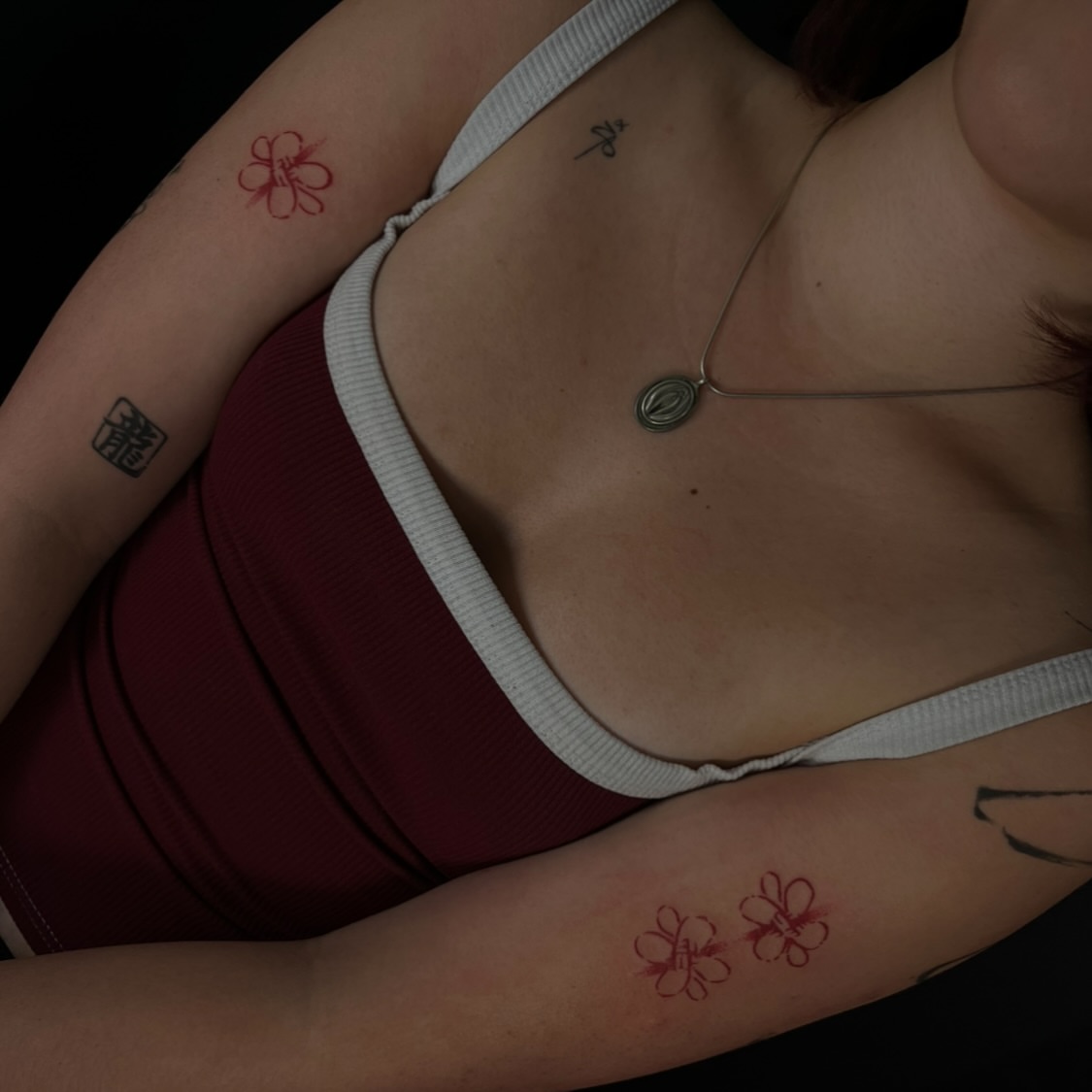 Flower American traditional tattoo on the upper arm by lela