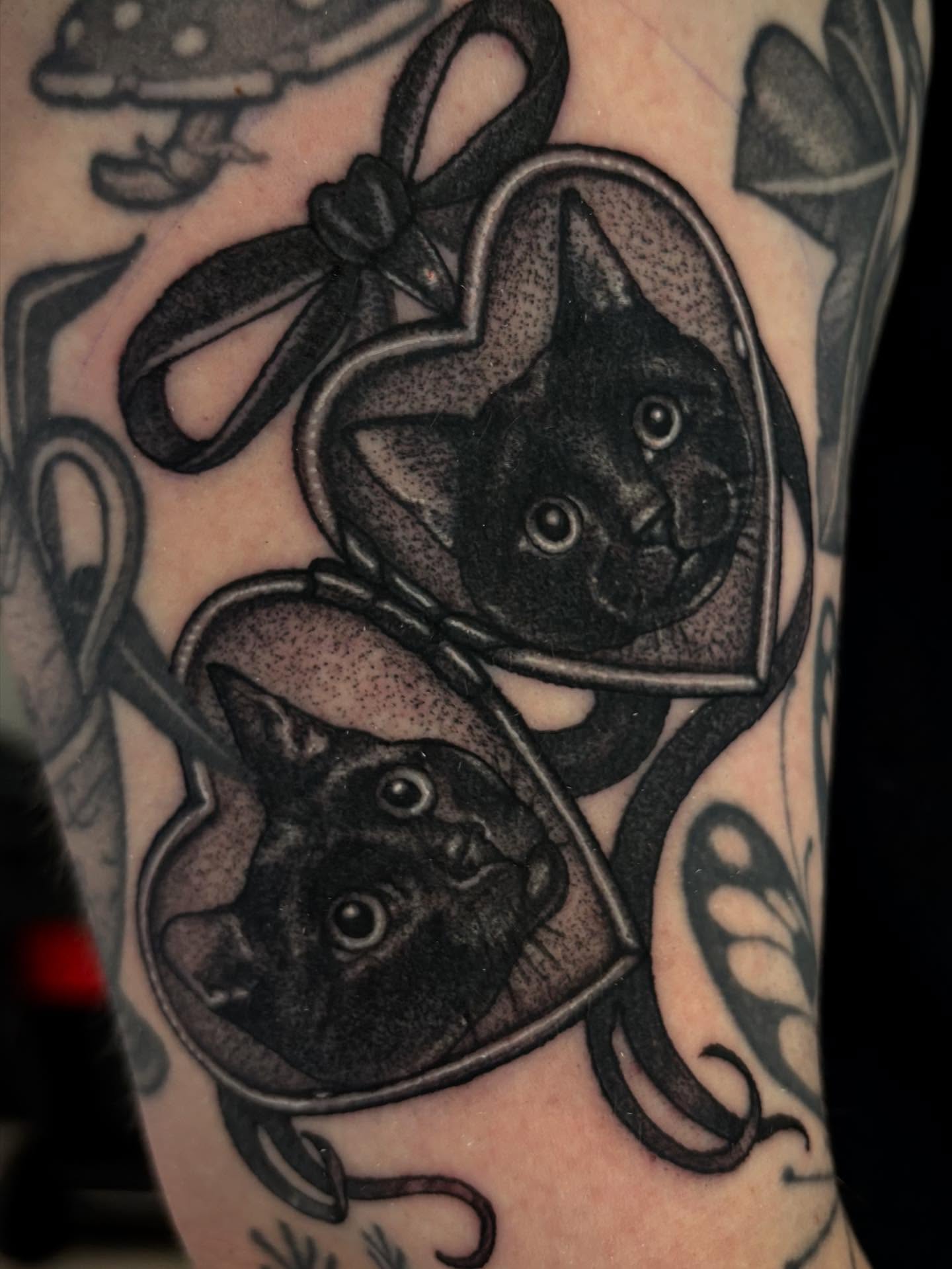 Black cats dotwork tattoo on the forearm by Tara, Exeter, Pennsylvania