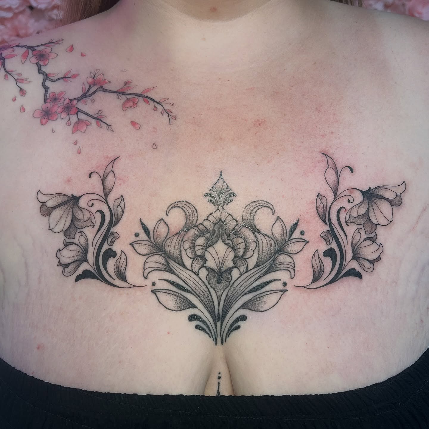 Floral design ornamental tattoo on the chest by 𝒱𝒽𝓎𝓍𝒾𝓃