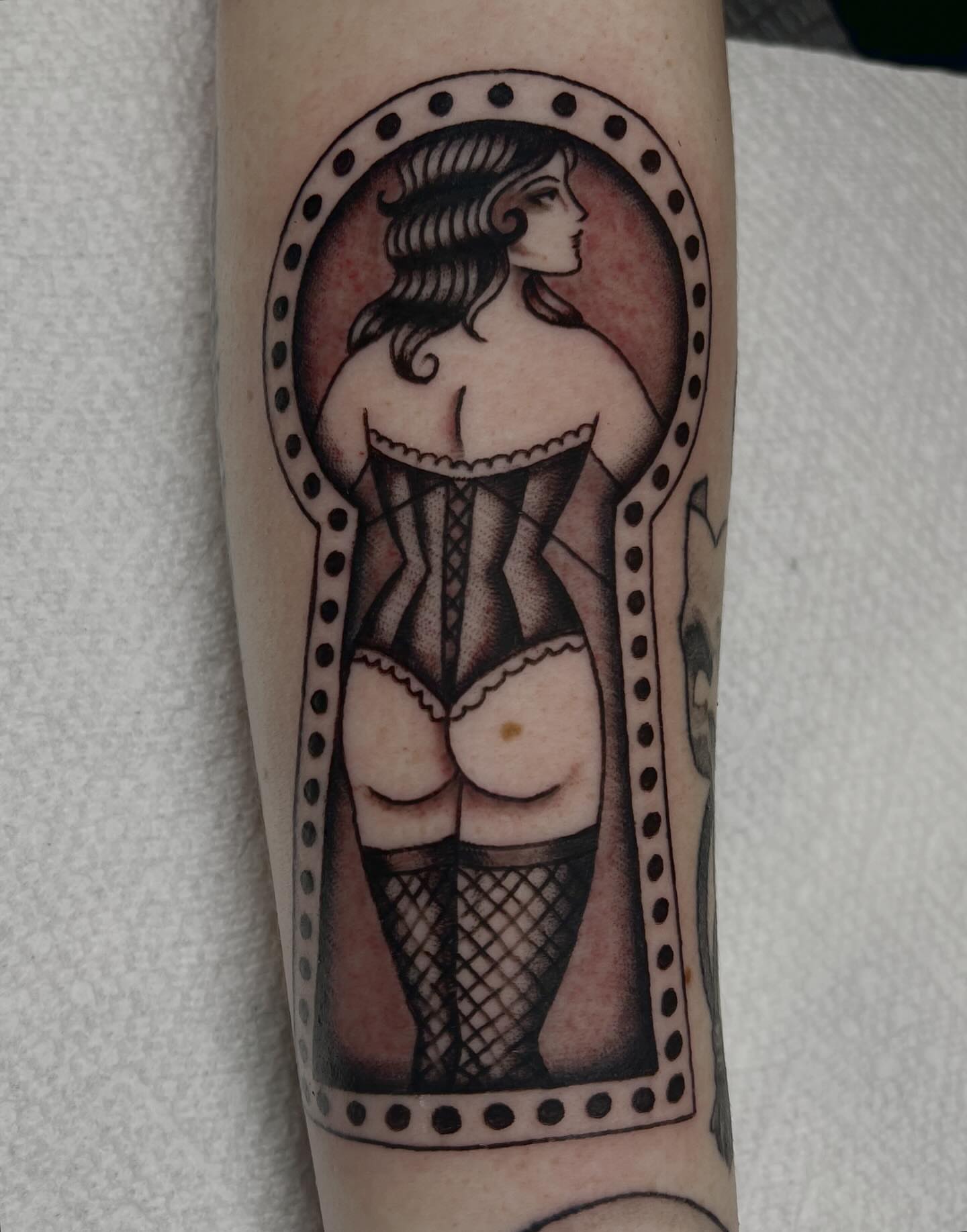 Corseted woman black and grey tattoo on the forearm by Liv :)