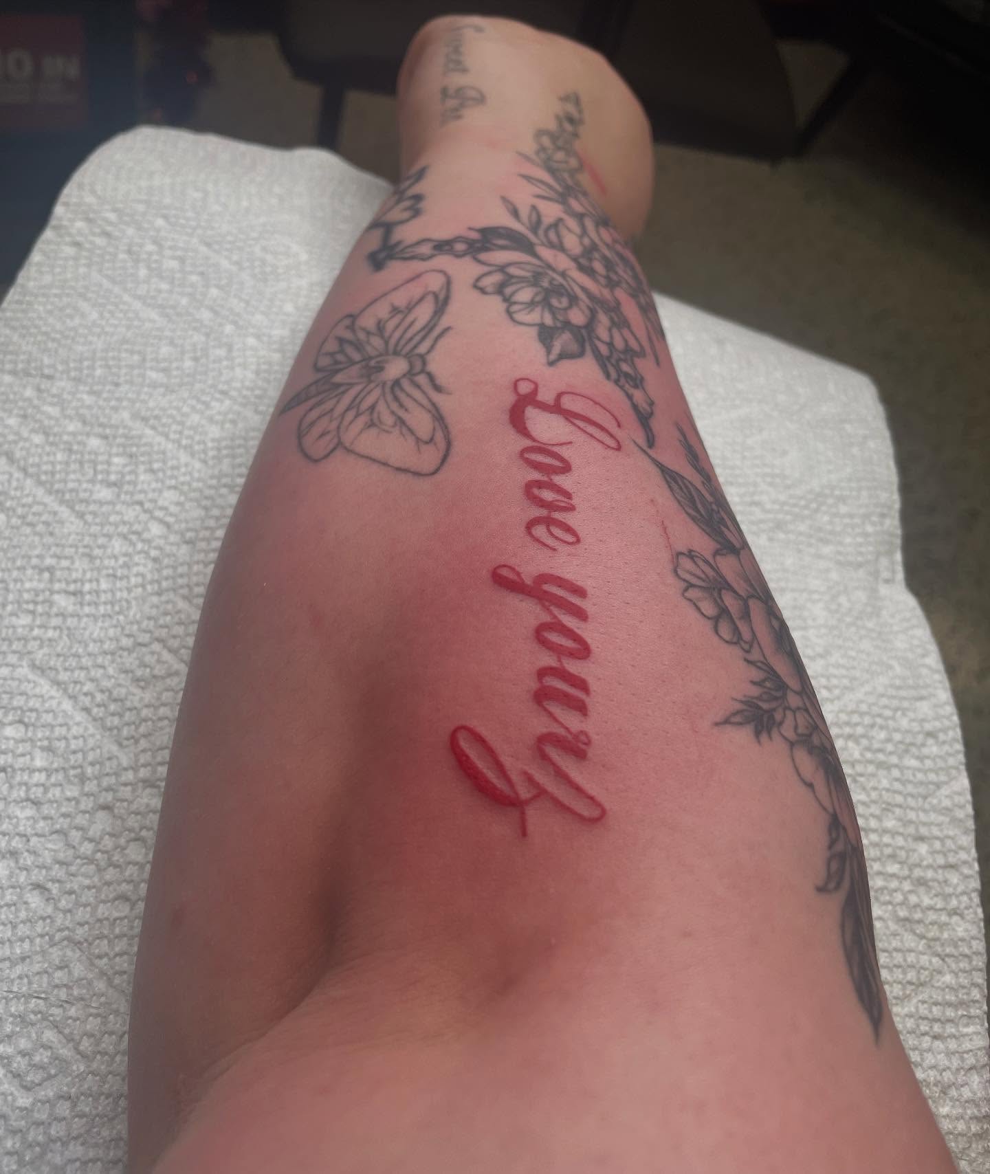 Love yourself lettering script tattoo on the forearm by Nyah Ramirez