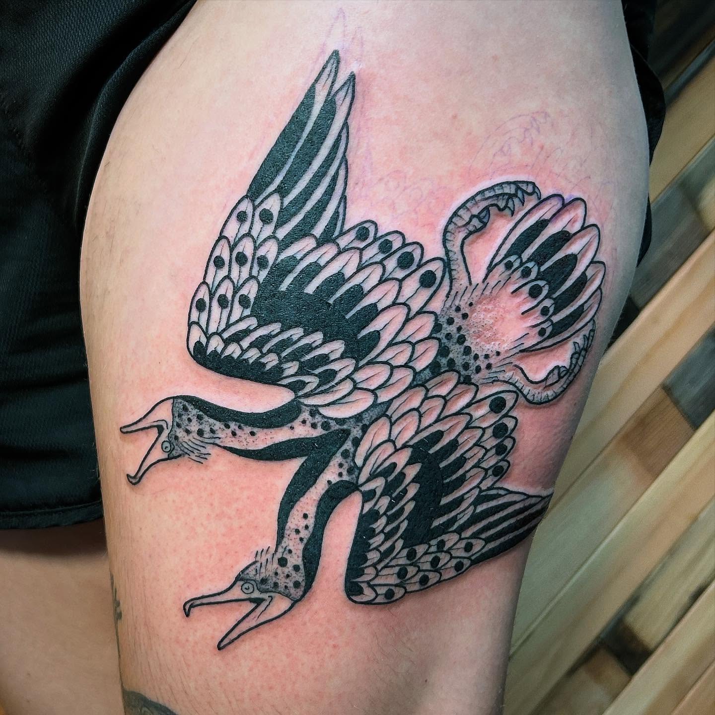 Birds American traditional tattoo on the thigh by Erica Finley