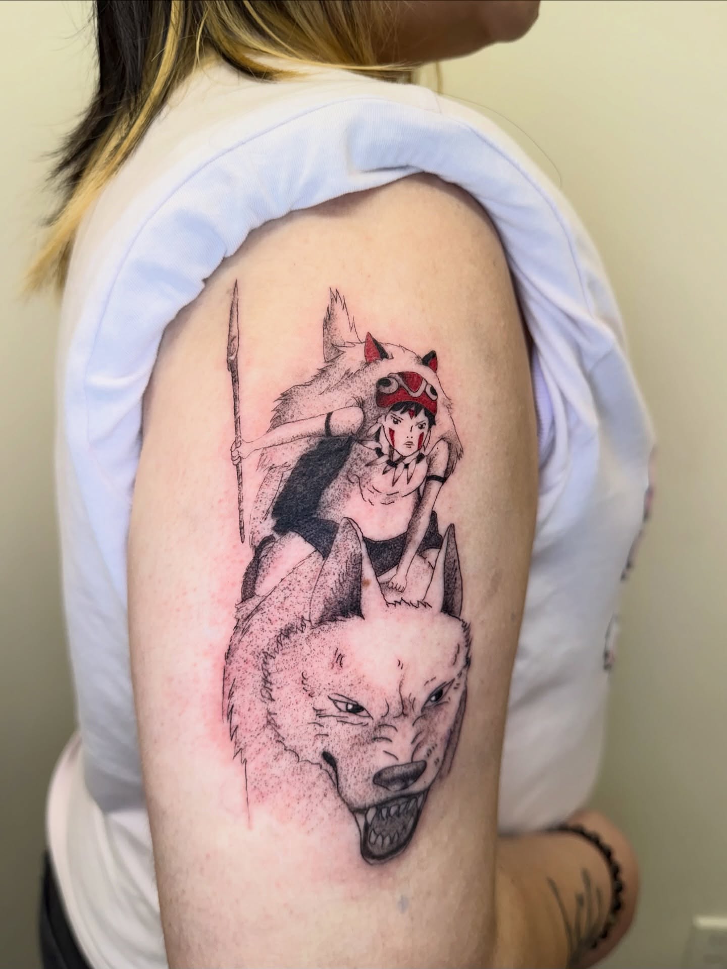 Anime character with wolf dotwork tattoo on the shoulder by Bryan Nguyen