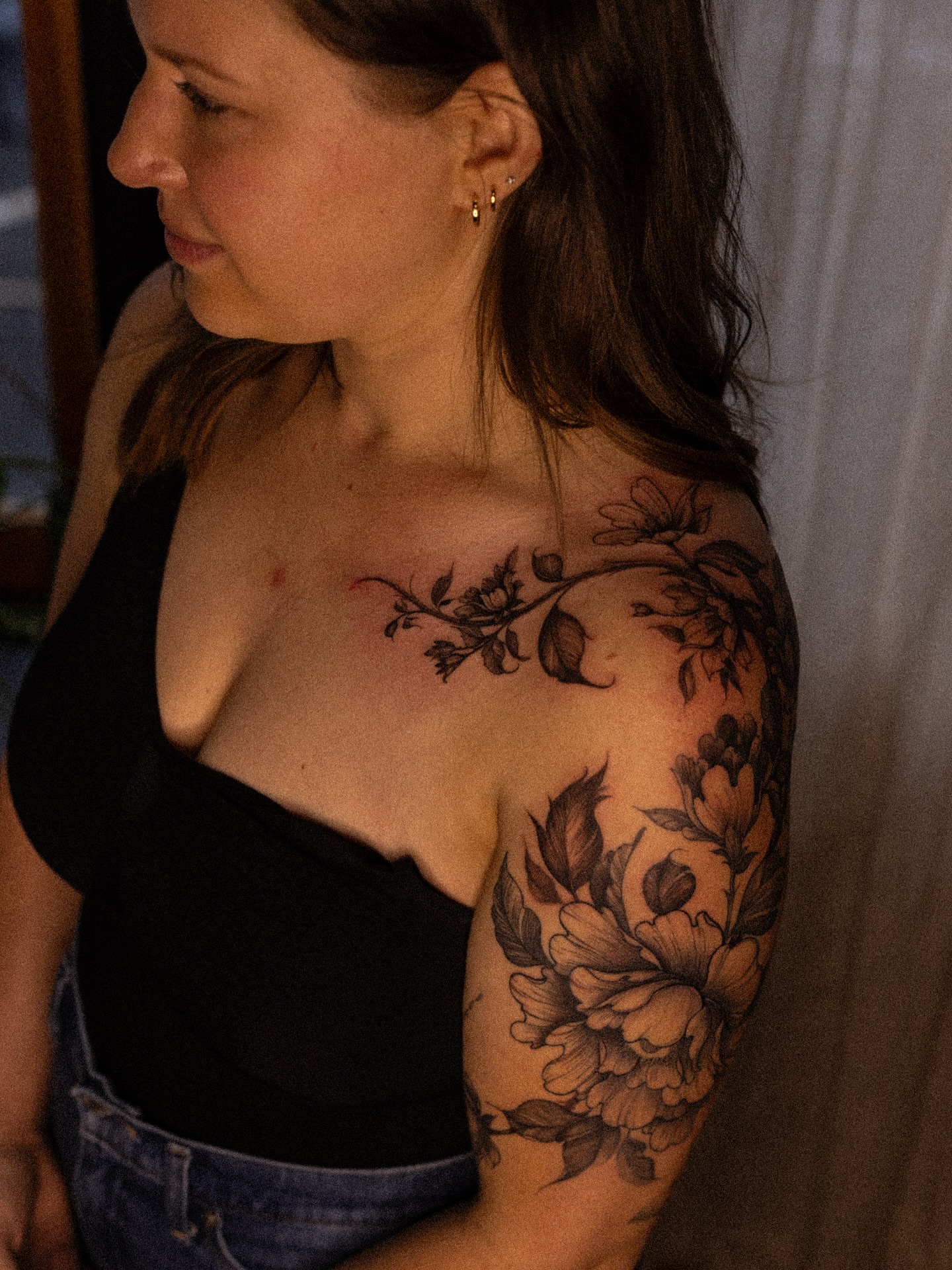 Floral bouquet black and grey tattoo on the shoulder by Brad Simmons
