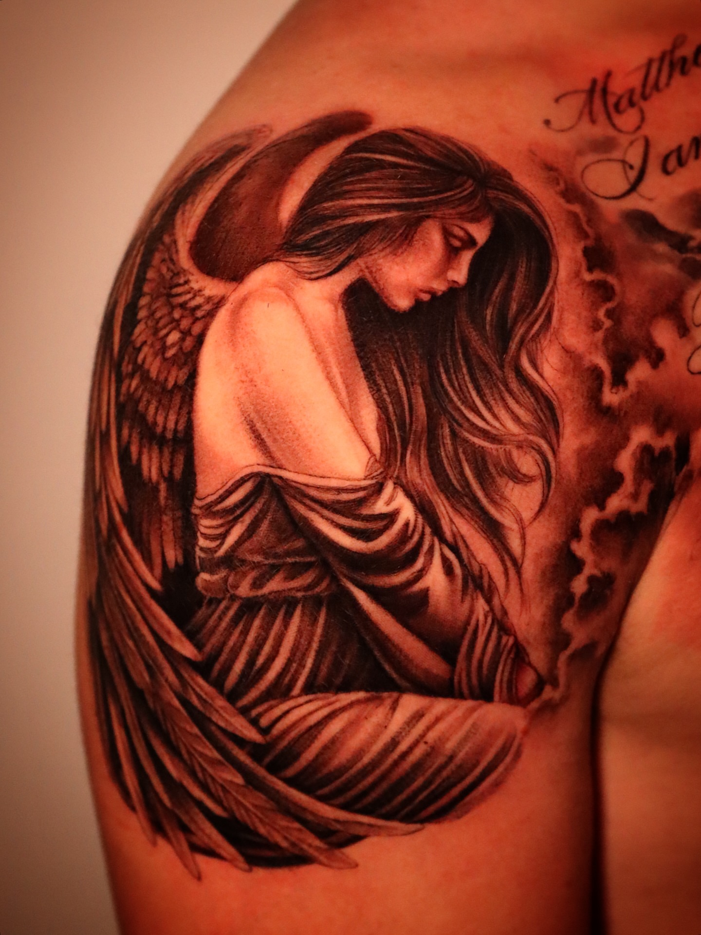 Angel realism tattoo on the shoulder by elvis flores