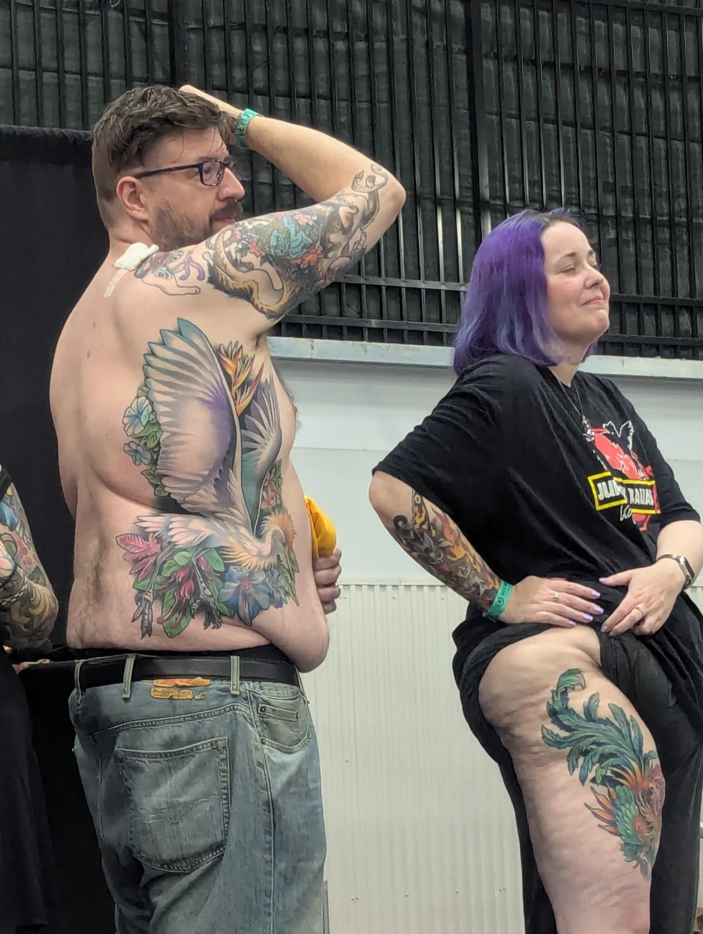 Bird and floral American traditional tattoo on the torso by Devon Greig